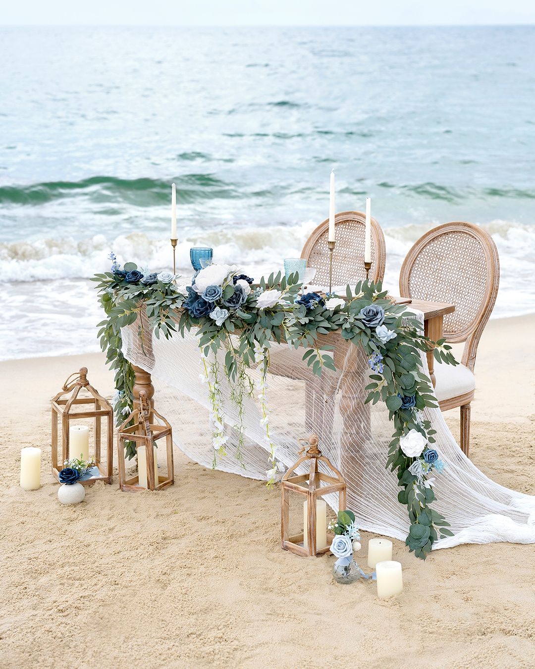 This photo shows a beautiful Rose Morning Sapphire Welcome Flower tabletop runway. The runway is made of pink roses, sapphires and green leaves. It is the perfect decoration for weddings or other celebrations.