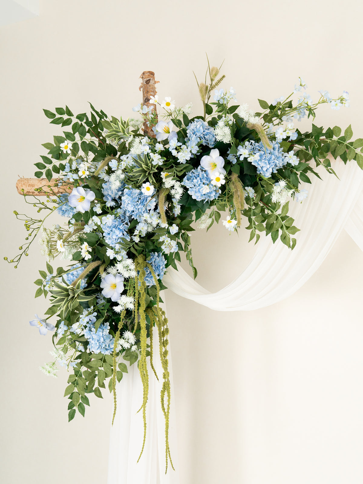 Middle Hydrangea Daisy Larkspur Greenery Floral Arch with Draping for Wedding Ceremony & Reception Backdrop in Powder Blue Meadow | Cora