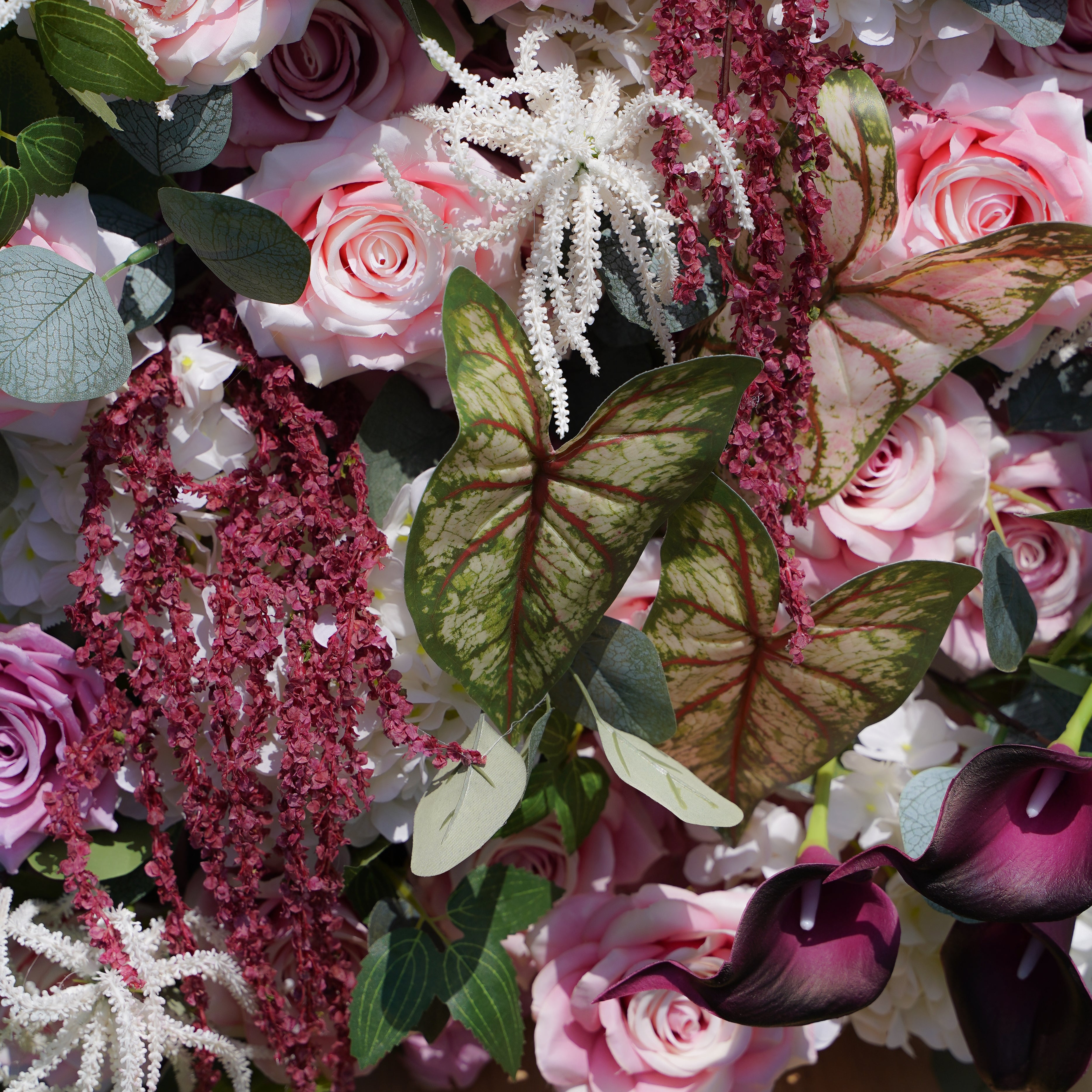 This is a photo of Rose morning Jacqueline 5D Fabric Faux Roller Blind Flower Wall. The flower wall is made of high-quality fabric and made of delicate roses, which looks realistic and beautiful. A flower wall is the perfect decoration for any occasion, whether it&