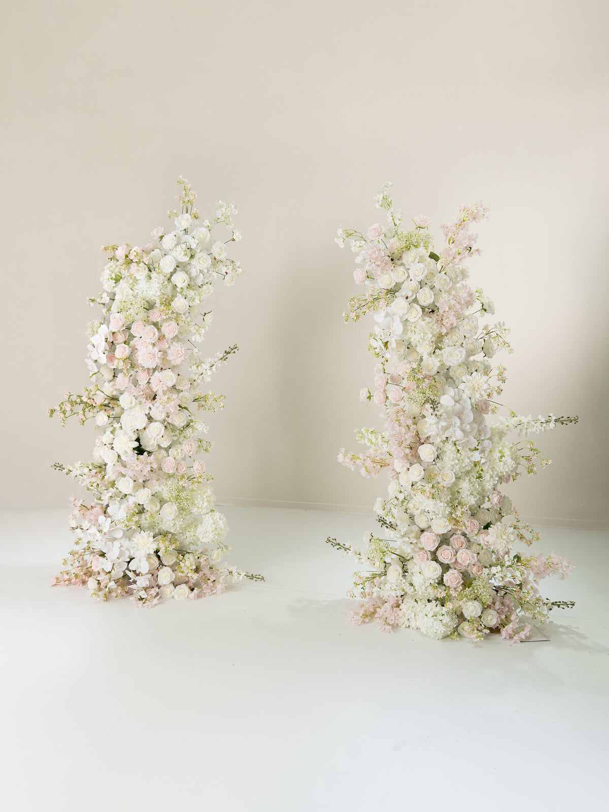 Gerisa: All White Silk Floral Ground Horn Arch Arrangement with Cascading Amaranthus Greenery for Romantic Minimalist Weddings & Garden Event Decor Including Frame