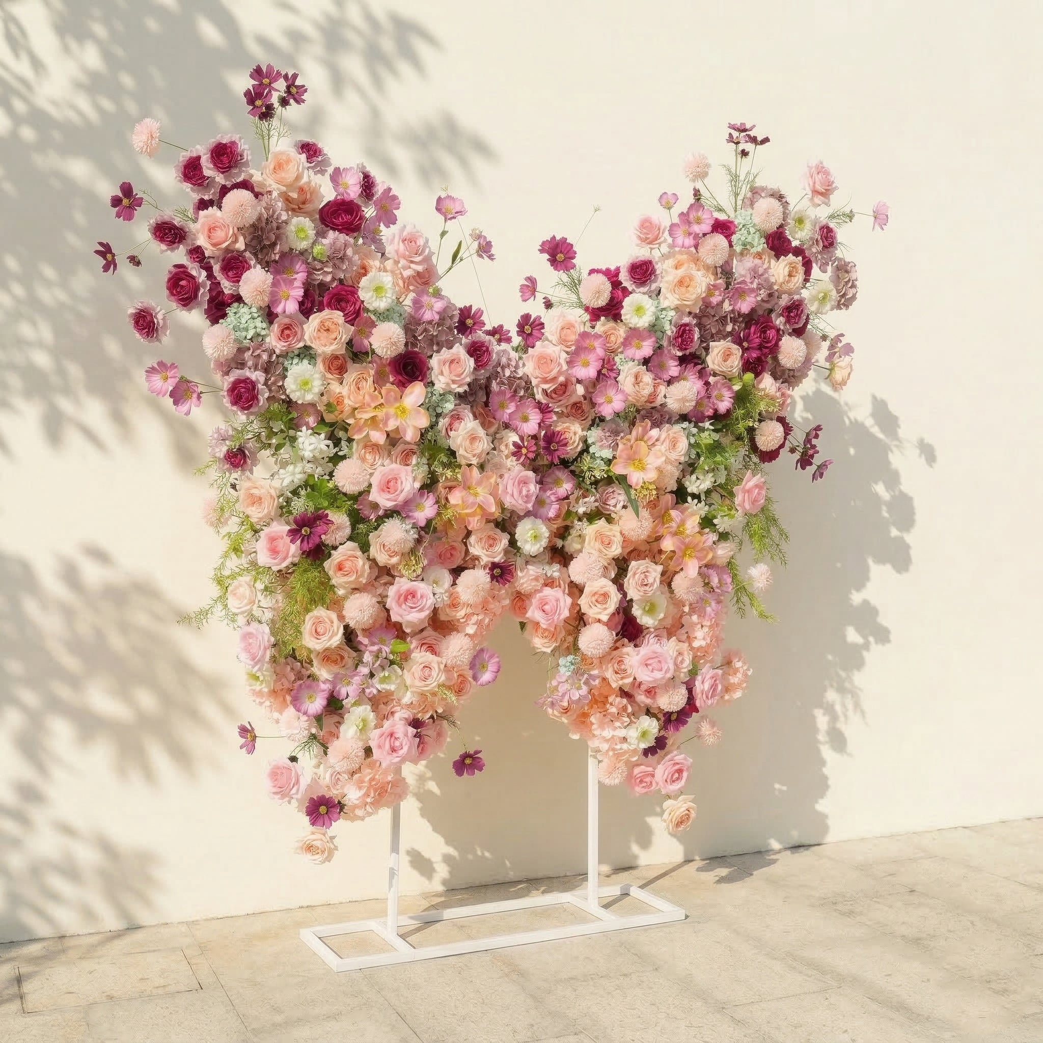 Lumeria: Exquisite Blush & Berry Butterfly-Shaped Flower Wall for Luxury Events & Parties Backdrop