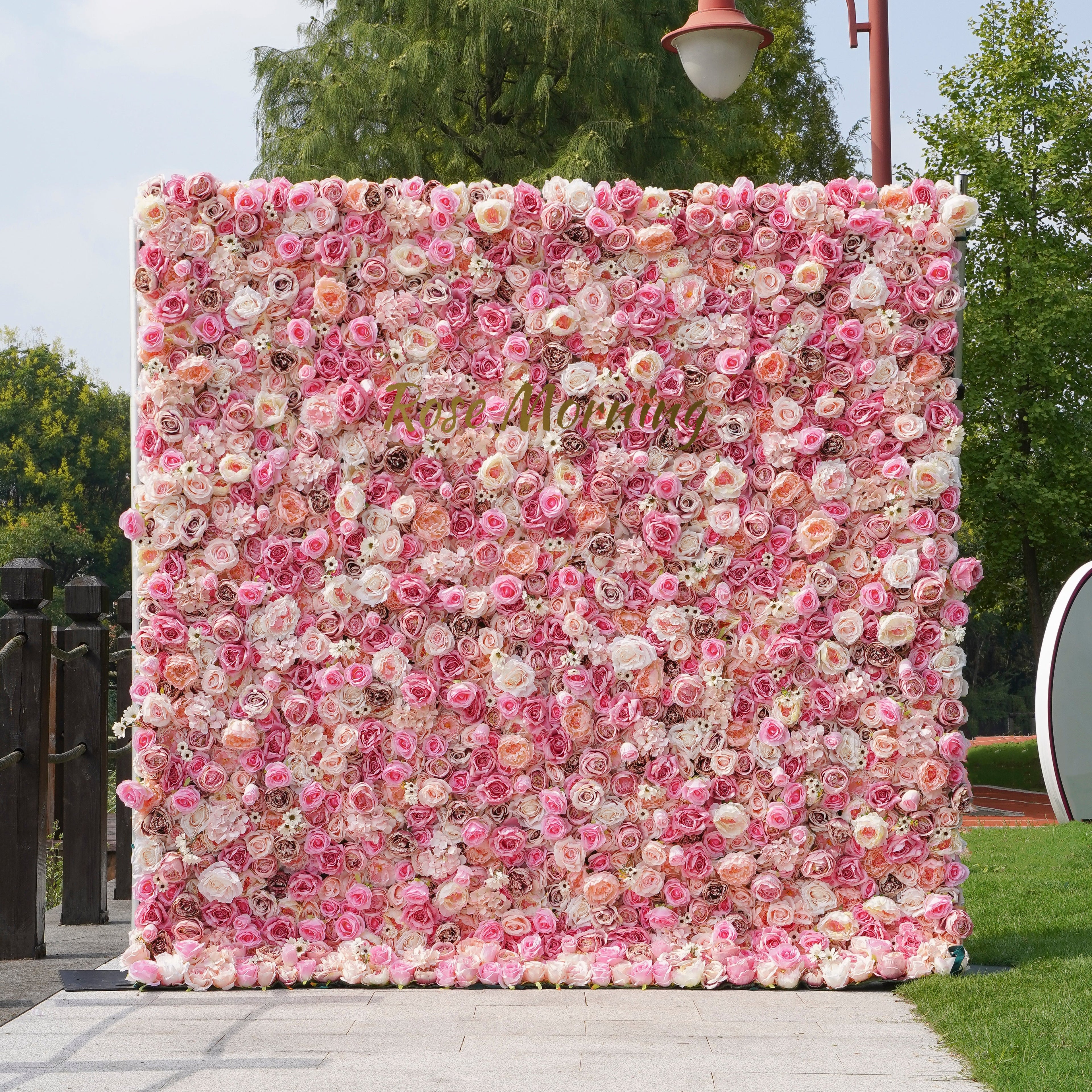 Rose Morning“The flower walls are made of artificial flowers in various colors, layered at different levels to create a lush, elegant and natural look. The exclusive zipper design and roll-up design make it easy to install and remove.”