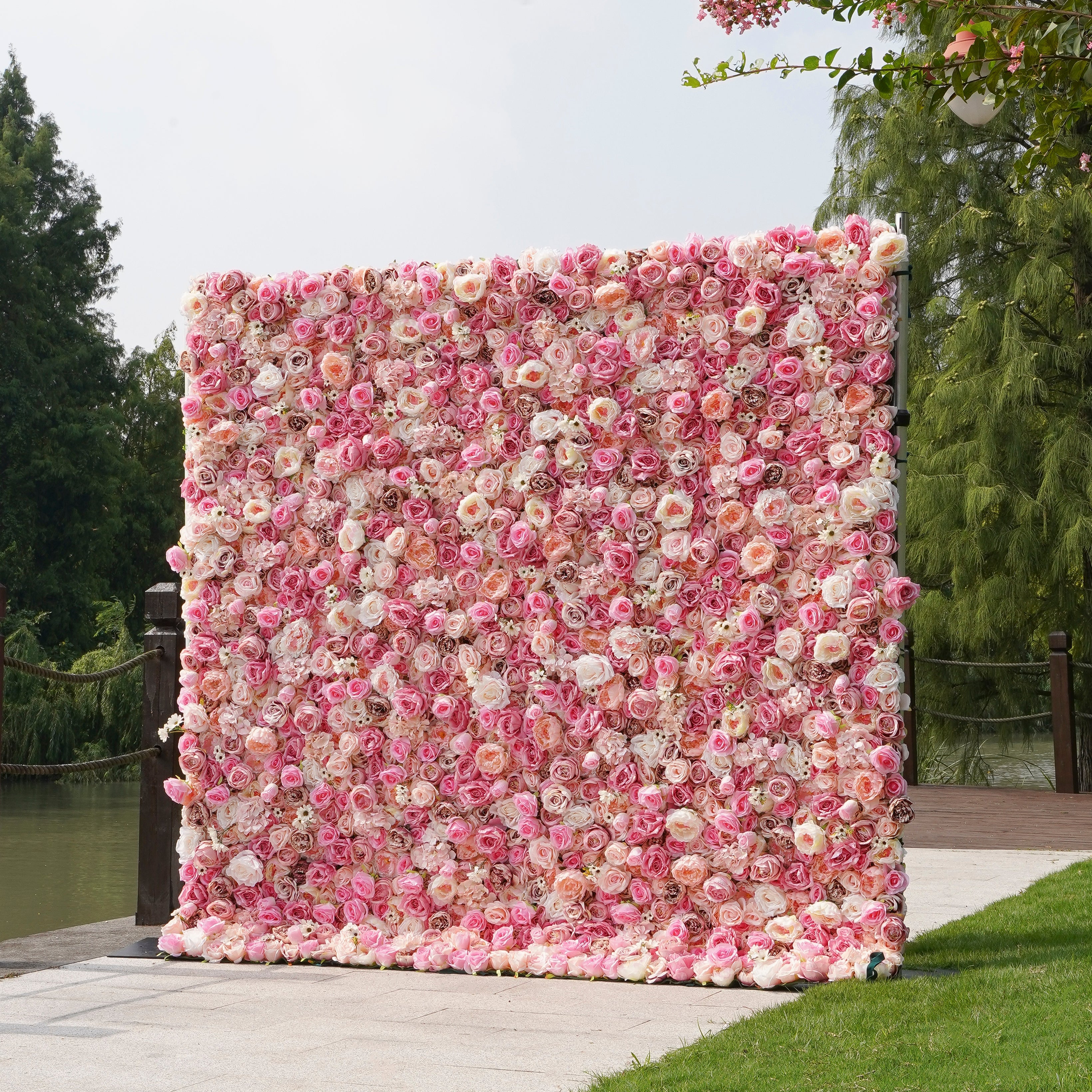 Rose Morning“The flower walls are made of artificial flowers in various colors, layered at different levels to create a lush, elegant and natural look. The exclusive zipper design and roll-up design make it easy to install and remove.”
