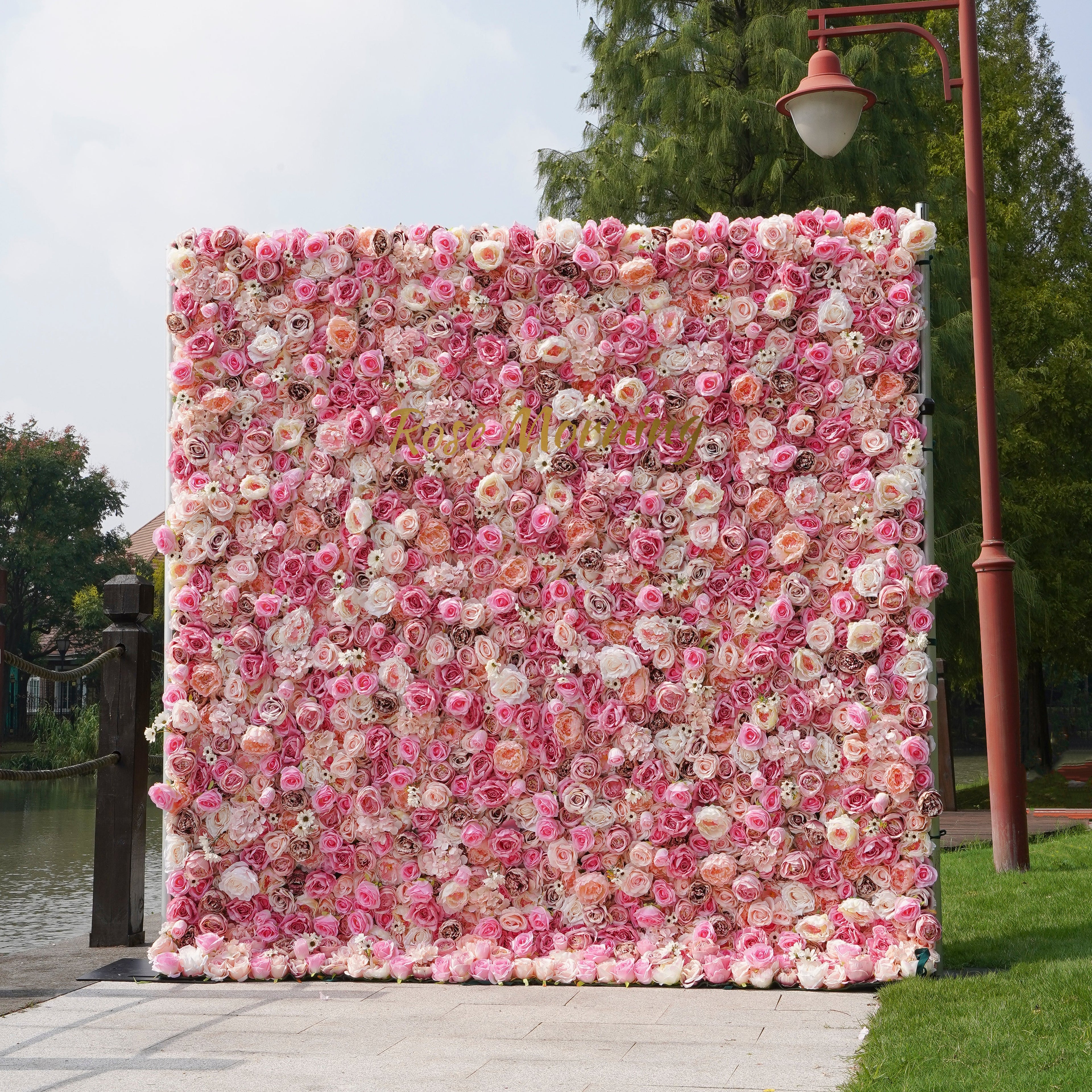 Rose Morning“The flower walls are made of artificial flowers in various colors, layered at different levels to create a lush, elegant and natural look. The exclusive zipper design and roll-up design make it easy to install and remove.”