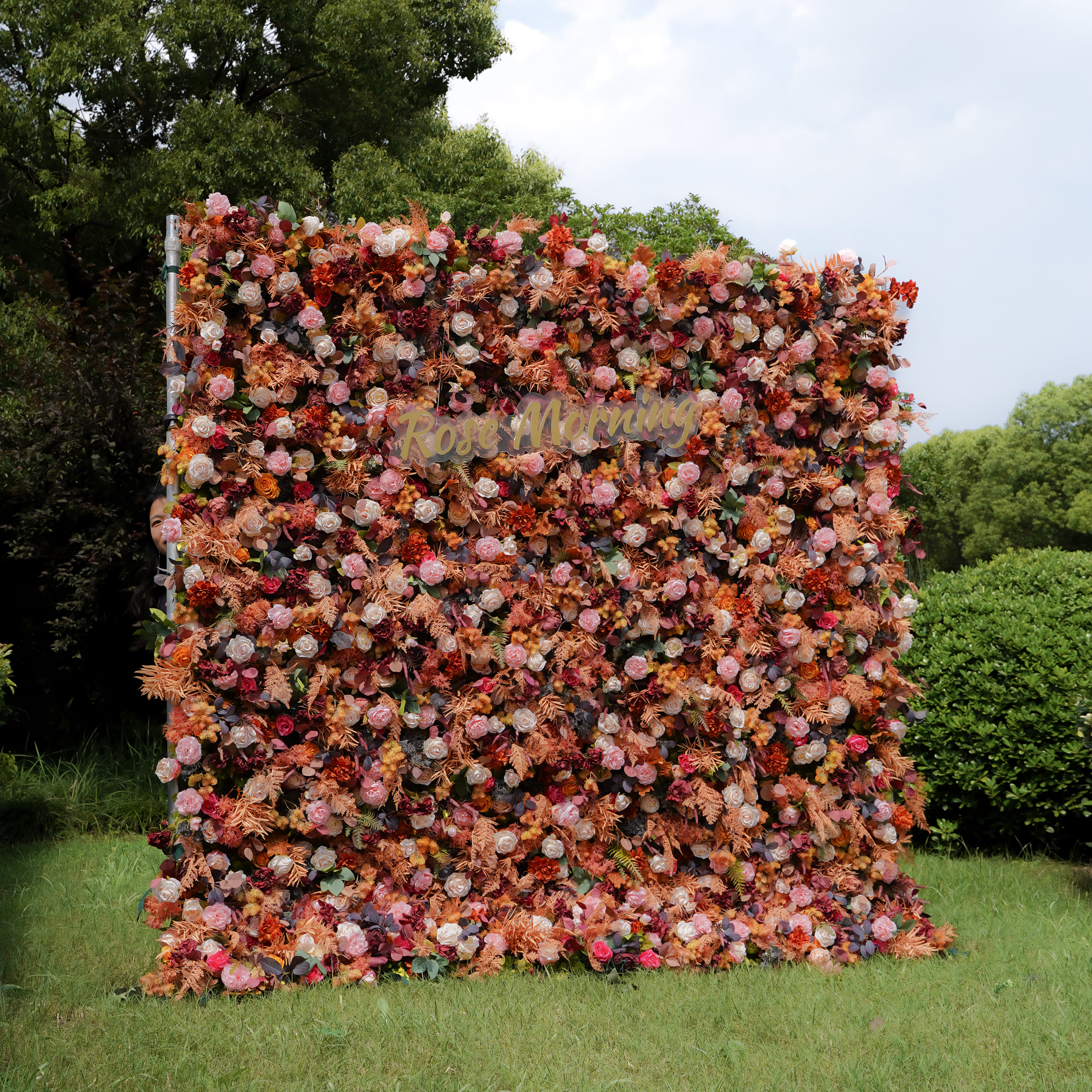 Rose Morning“The flower walls are made of artificial flowers in various colors, layered at different levels to create a lush, elegant and natural look. The exclusive zipper design and roll-up design make it easy to install and remove.”
