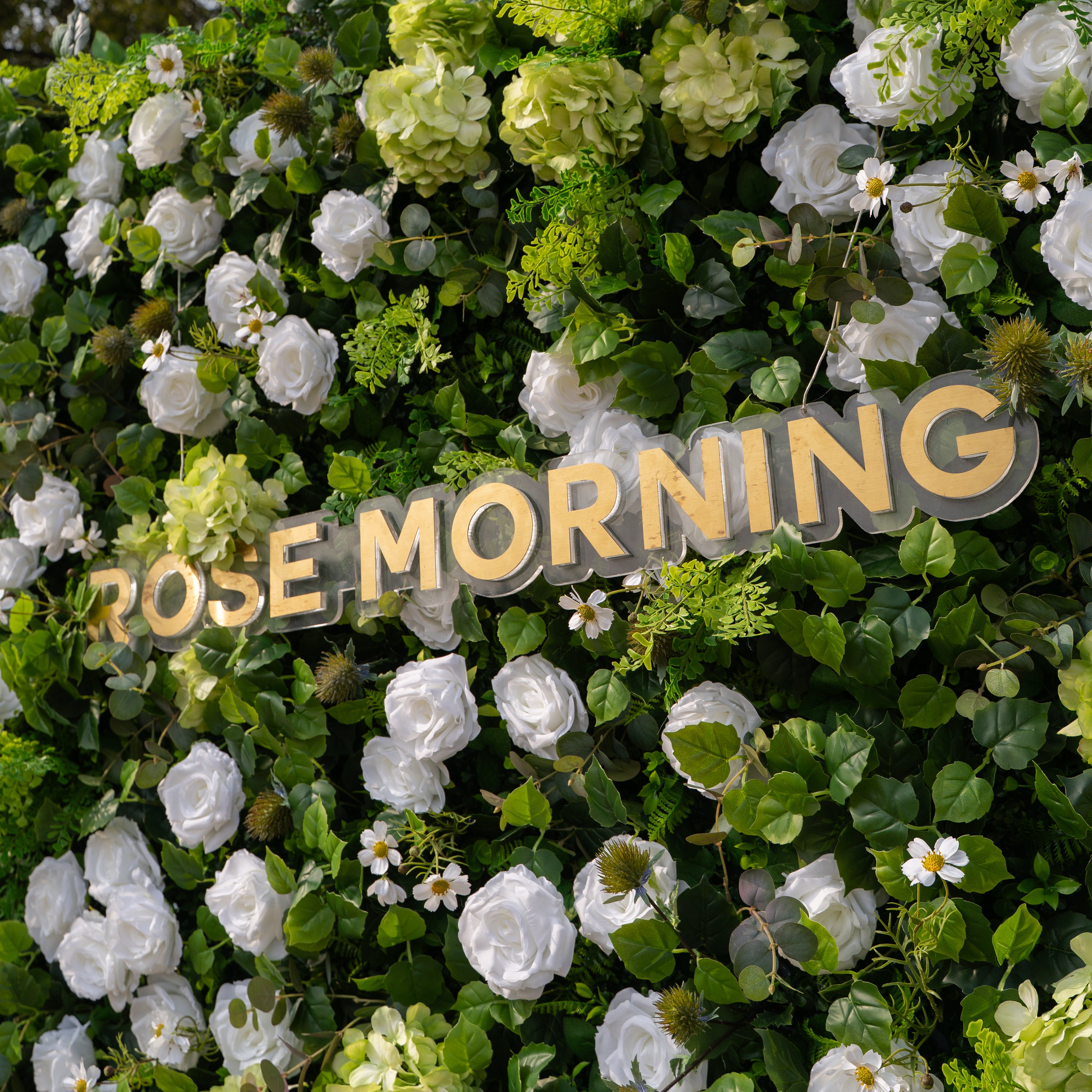 Cressida: 3D Elegant White Silk Rose & Greenery Foliage Wall Roll-Up Fabric Backdrop for Luxury Weddings, Parties & Botanical Decor