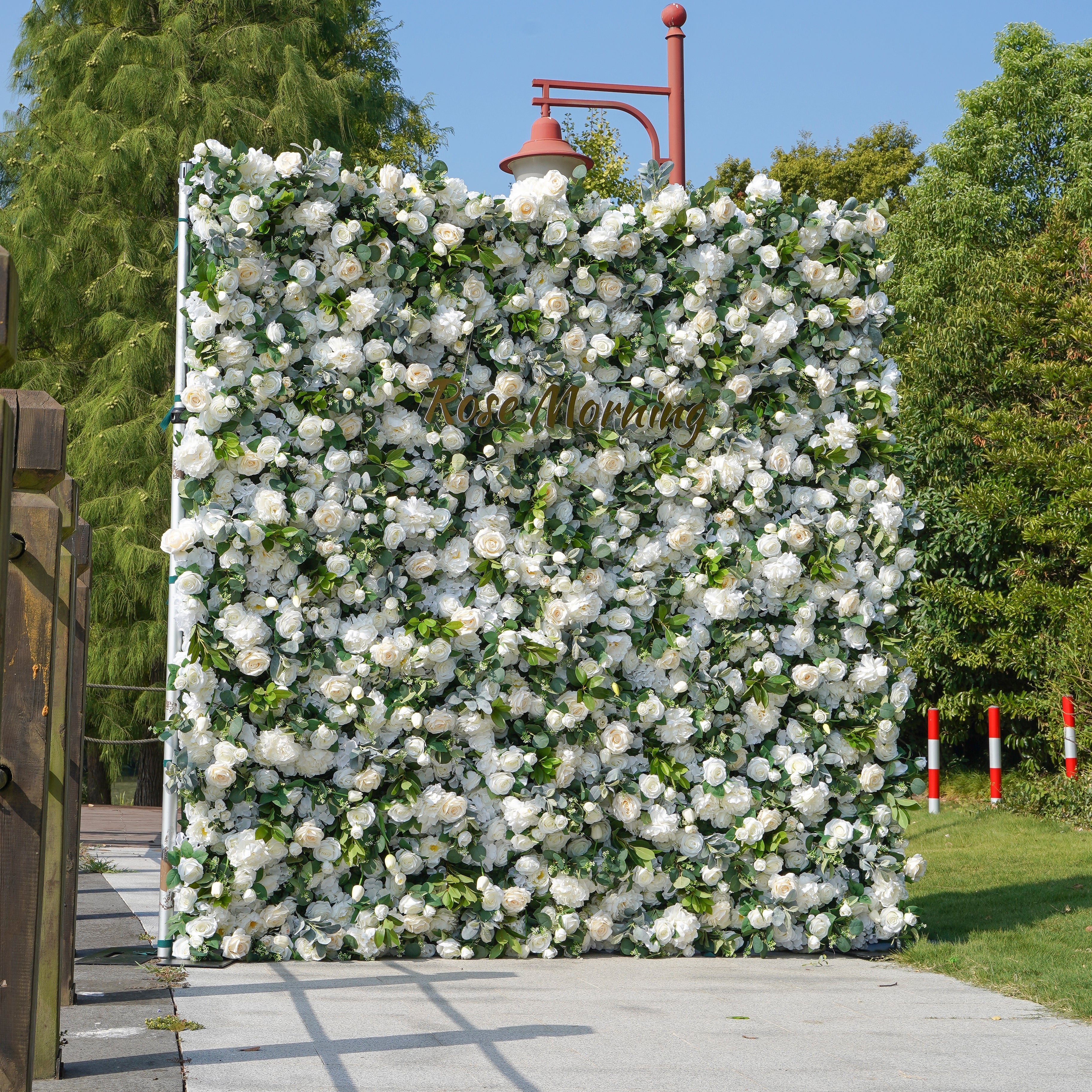 Rose Morning“The flower walls are made of artificial flowers in various colors, layered at different levels to create a lush, elegant and natural look. The exclusive zipper design and roll-up design make it easy to install and remove.”