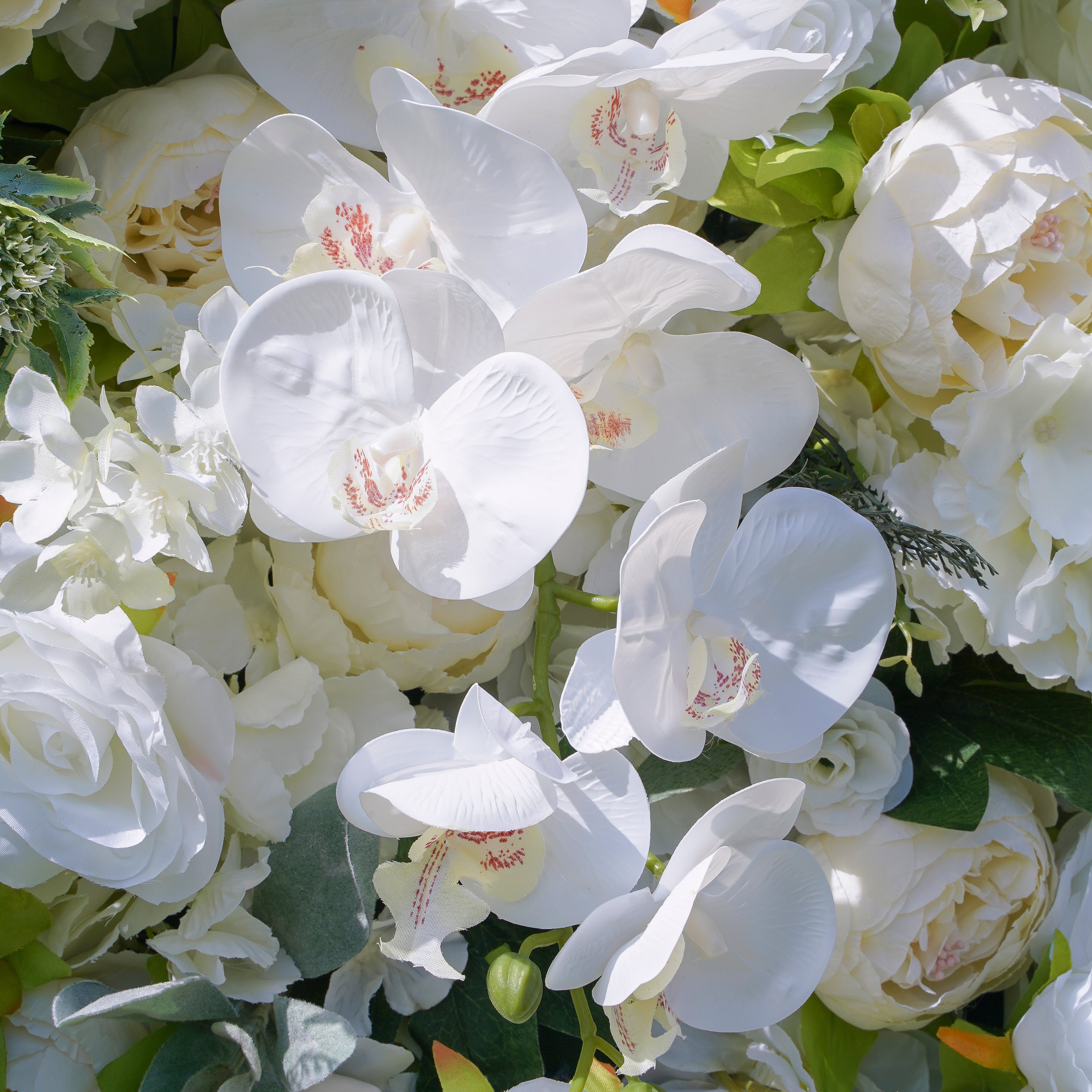 Rose Morning“The flower walls are made of artificial flowers in various colors, layered at different levels to create a lush, elegant and natural look. The exclusive zipper design and roll-up design make it easy to install and remove.”