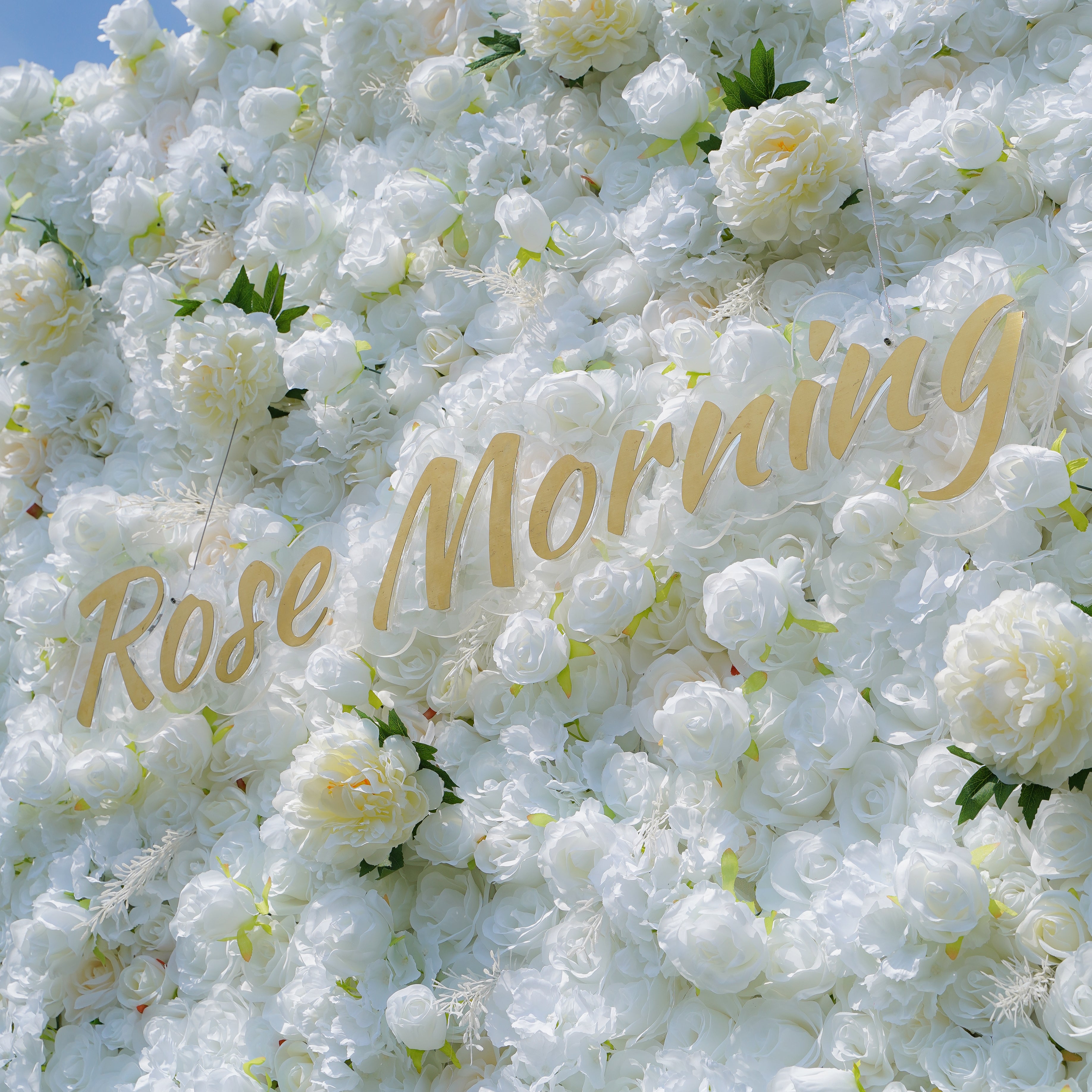 Rose Morning“The flower walls are made of artificial flowers in various colors, layered at different levels to create a lush, elegant and natural look. The exclusive zipper design and roll-up design make it easy to install and remove.”