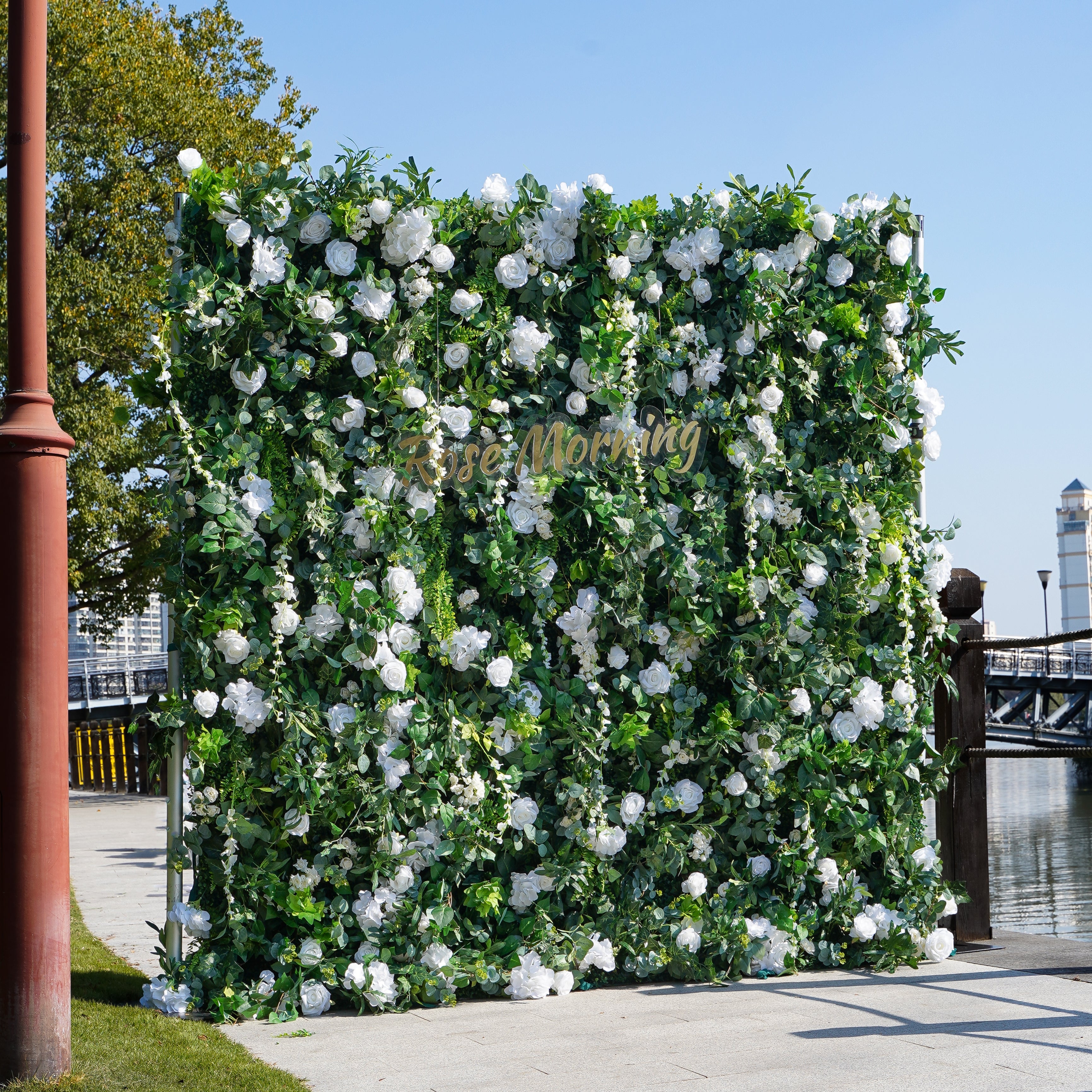 Rose Morning“The flower walls are made of artificial flowers in various colors, layered at different levels to create a lush, elegant and natural look. The exclusive zipper design and roll-up design make it easy to install and remove.”