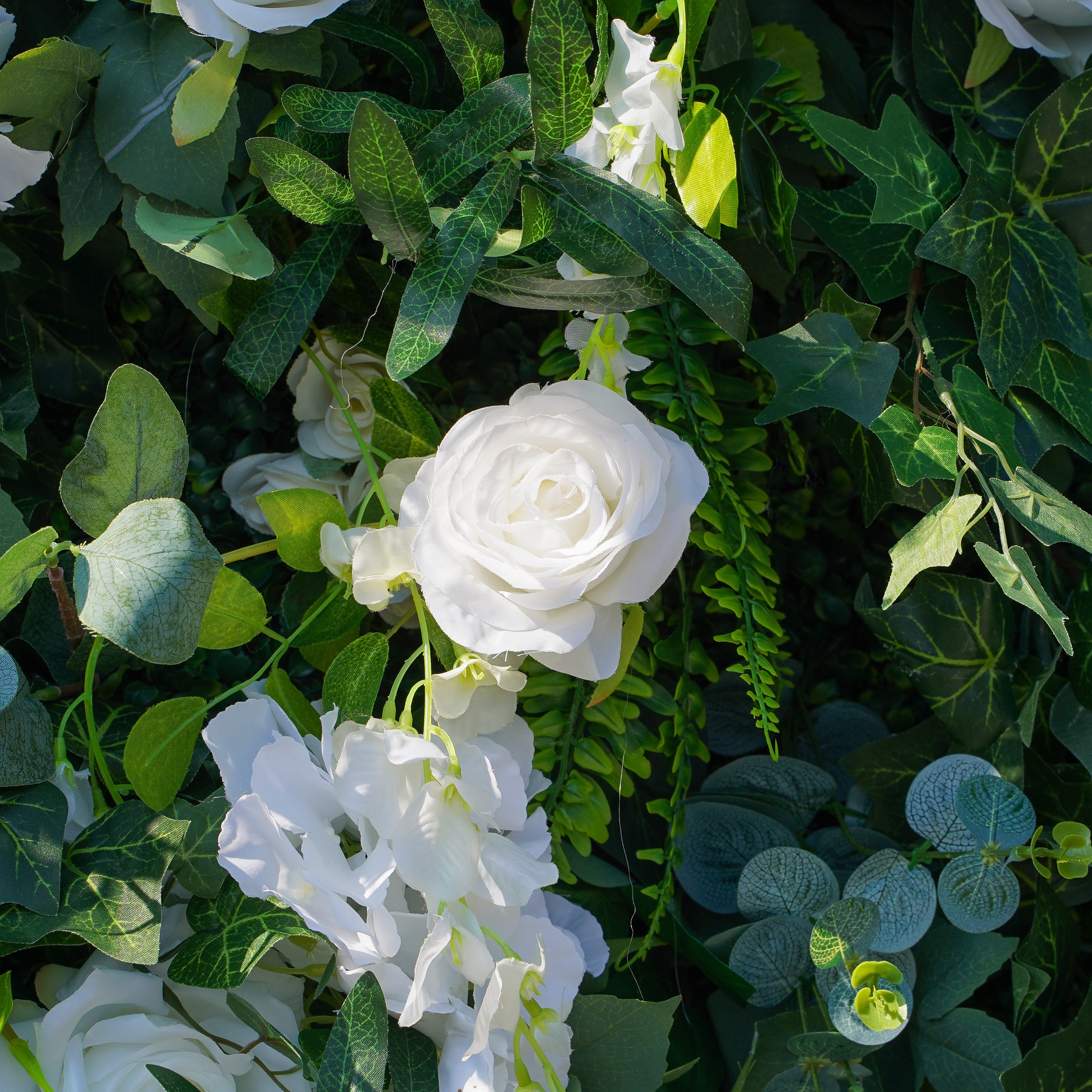 Rose Morning“The flower walls are made of artificial flowers in various colors, layered at different levels to create a lush, elegant and natural look. The exclusive zipper design and roll-up design make it easy to install and remove.”