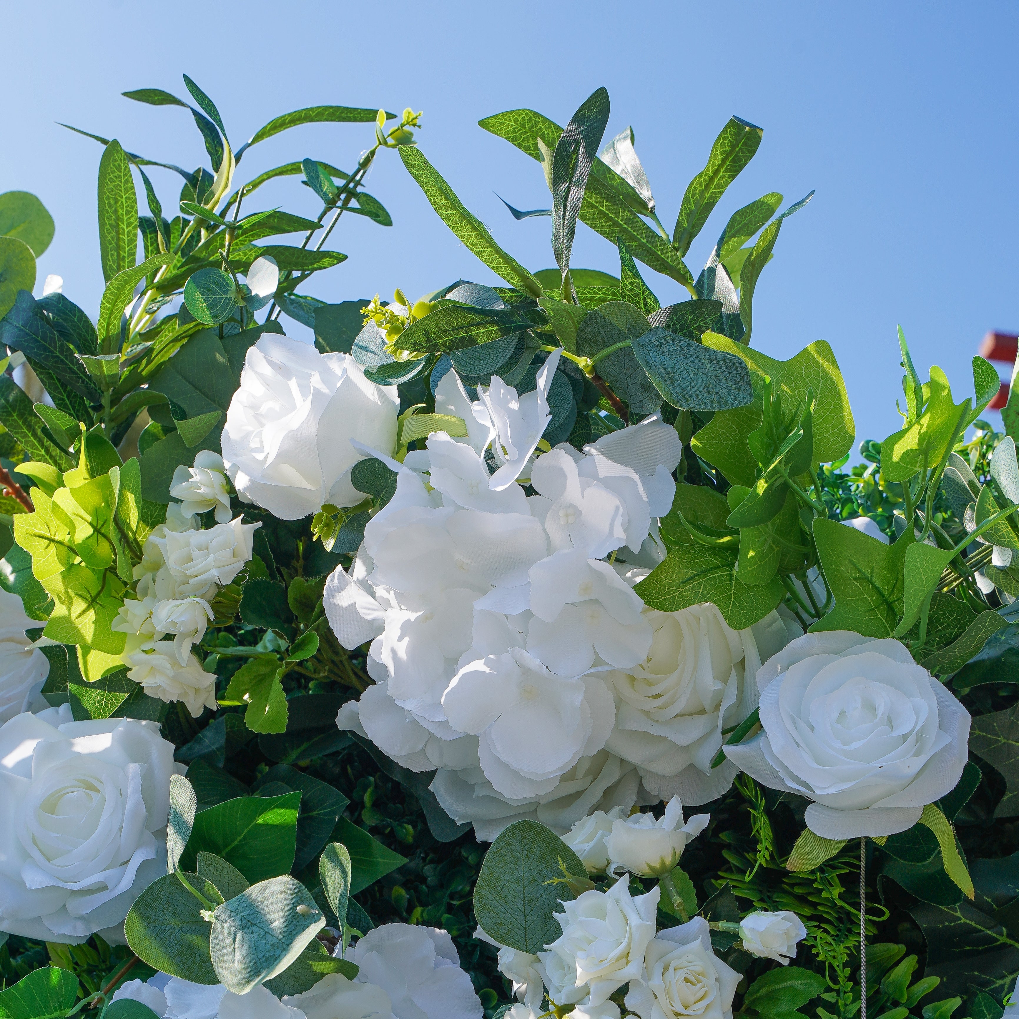 Rose Morning“The flower walls are made of artificial flowers in various colors, layered at different levels to create a lush, elegant and natural look. The exclusive zipper design and roll-up design make it easy to install and remove.”