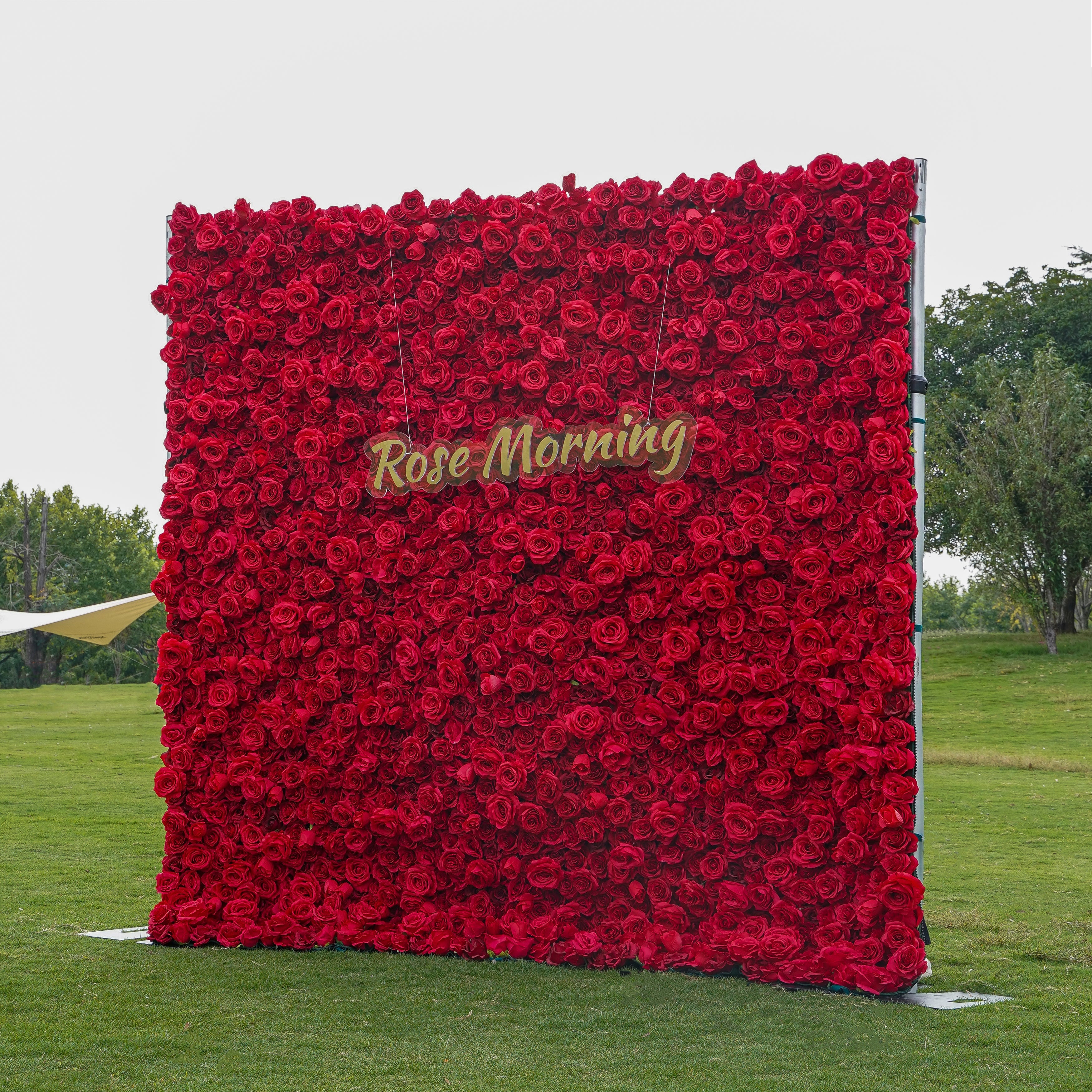 Rose Morning“The flower walls are made of artificial flowers in various colors, layered at different levels to create a lush, elegant and natural look. The exclusive zipper design and roll-up design make it easy to install and remove.”