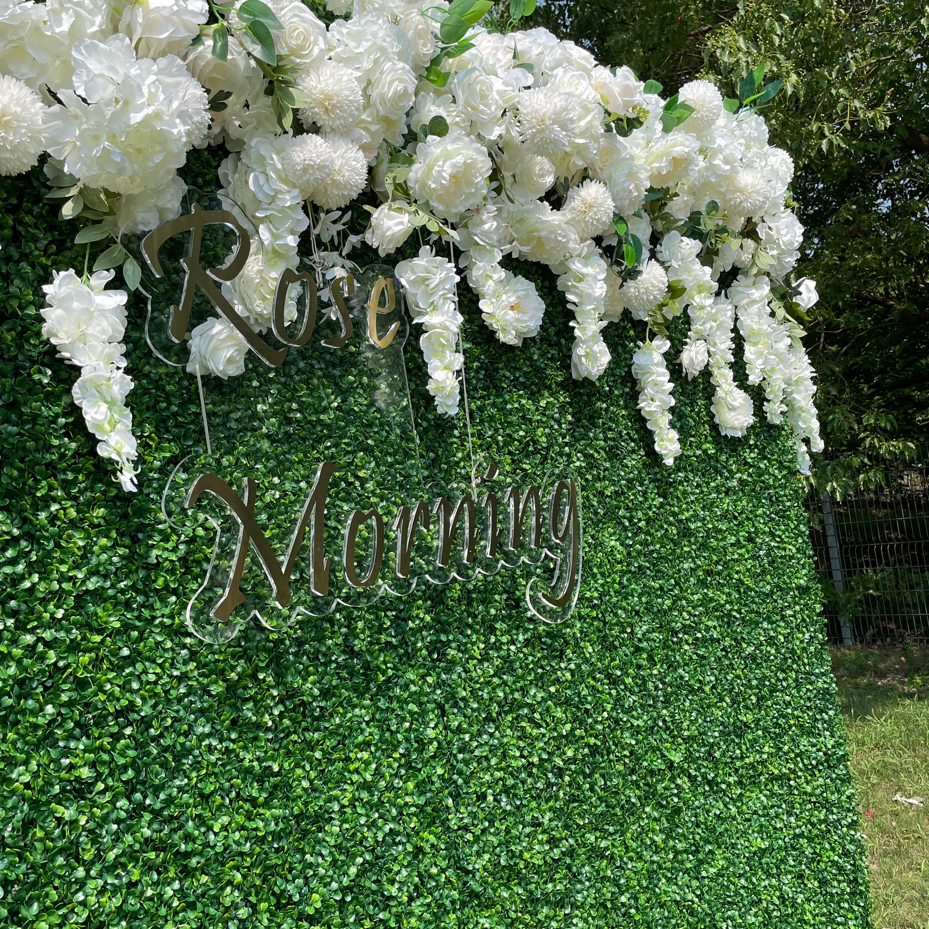 Rose Morning“The flower walls are made of artificial flowers in various colors, layered at different levels to create a lush, elegant and natural look. The exclusive zipper design and roll-up design make it easy to install and remove.”