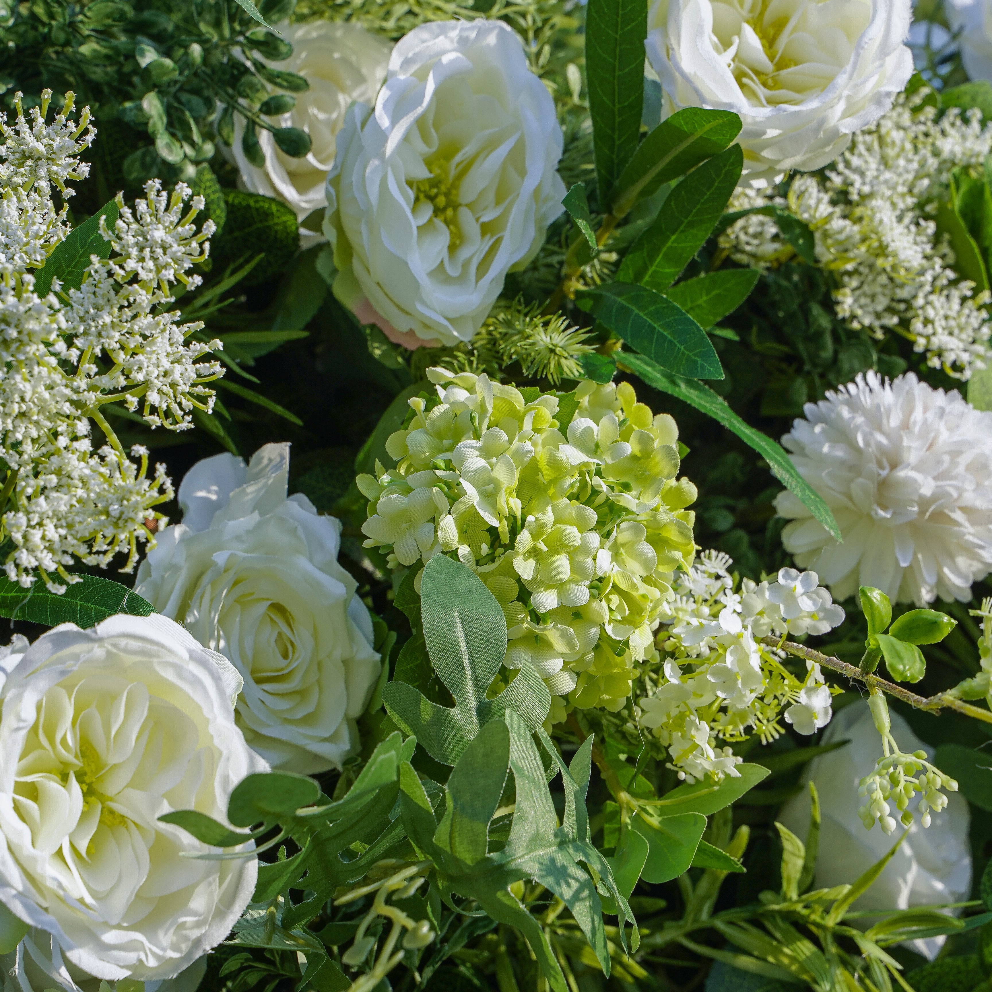 Rose Morning“The flower walls are made of artificial flowers in various colors, layered at different levels to create a lush, elegant and natural look. The exclusive zipper design and roll-up design make it easy to install and remove.”
