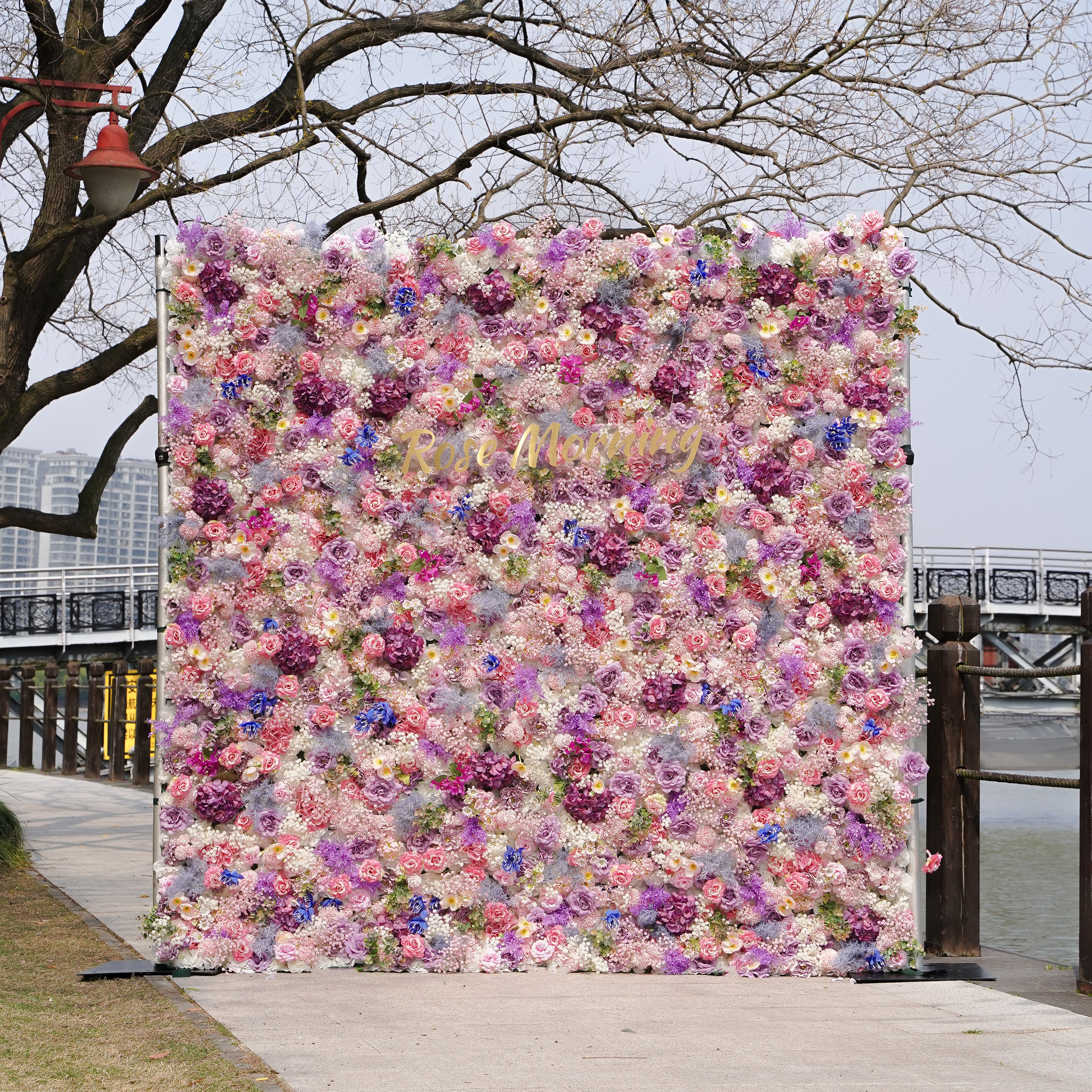 Rose Morning“The flower walls are made of artificial flowers in various colors, layered at different levels to create a lush, elegant and natural look. The exclusive zipper design and roll-up design make it easy to install and remove.”