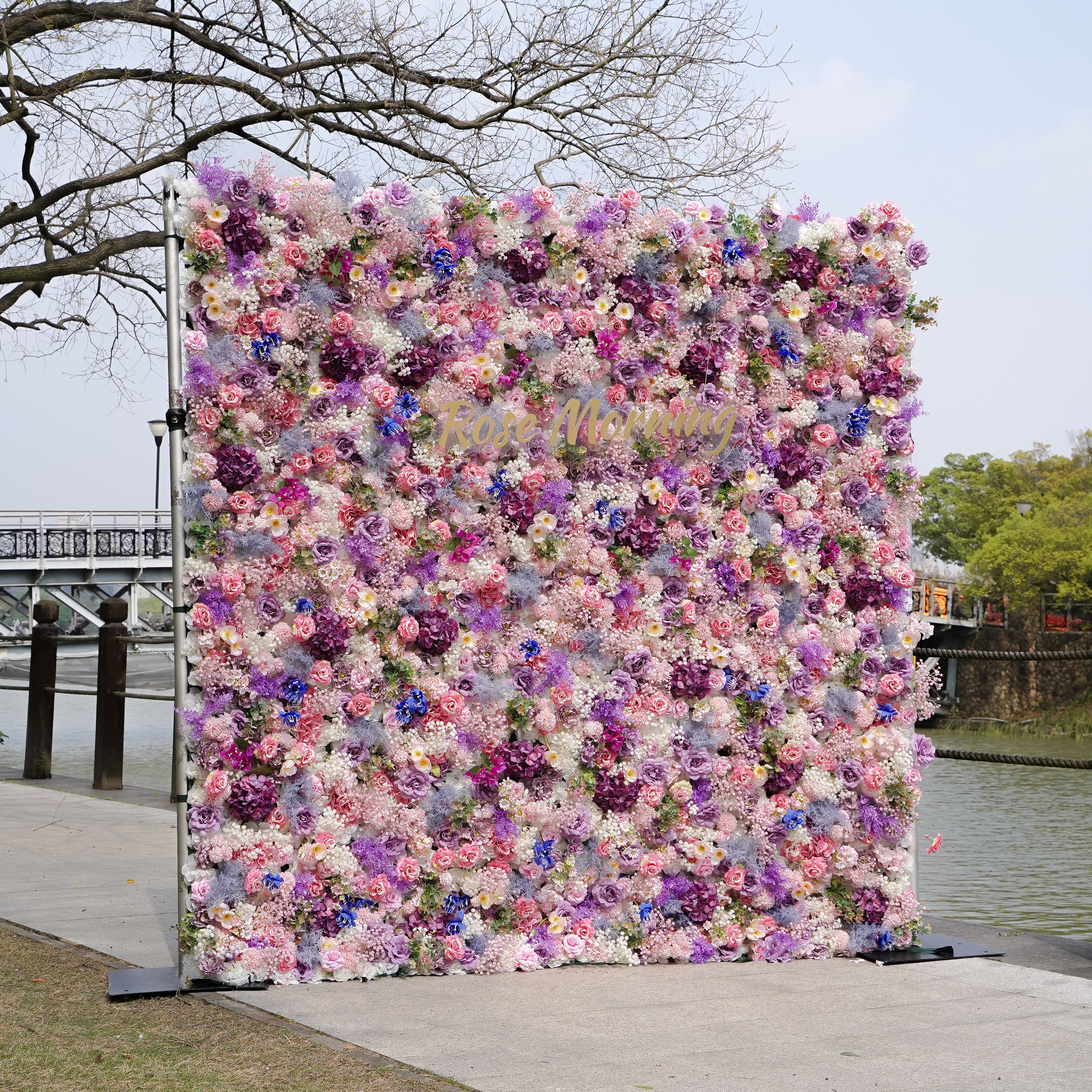 Rose Morning“The flower walls are made of artificial flowers in various colors, layered at different levels to create a lush, elegant and natural look. The exclusive zipper design and roll-up design make it easy to install and remove.”