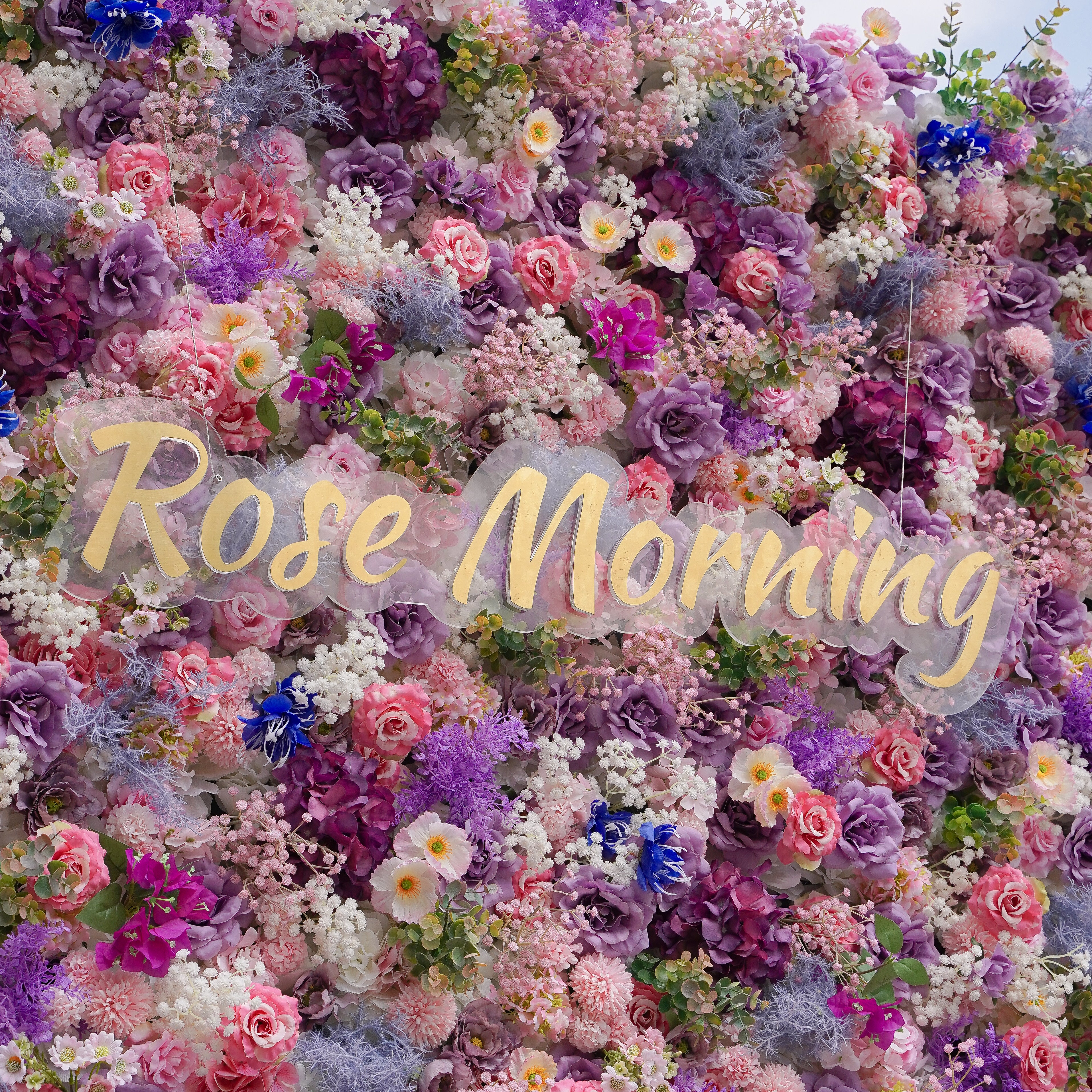 Rose Morning“The flower walls are made of artificial flowers in various colors, layered at different levels to create a lush, elegant and natural look. The exclusive zipper design and roll-up design make it easy to install and remove.”