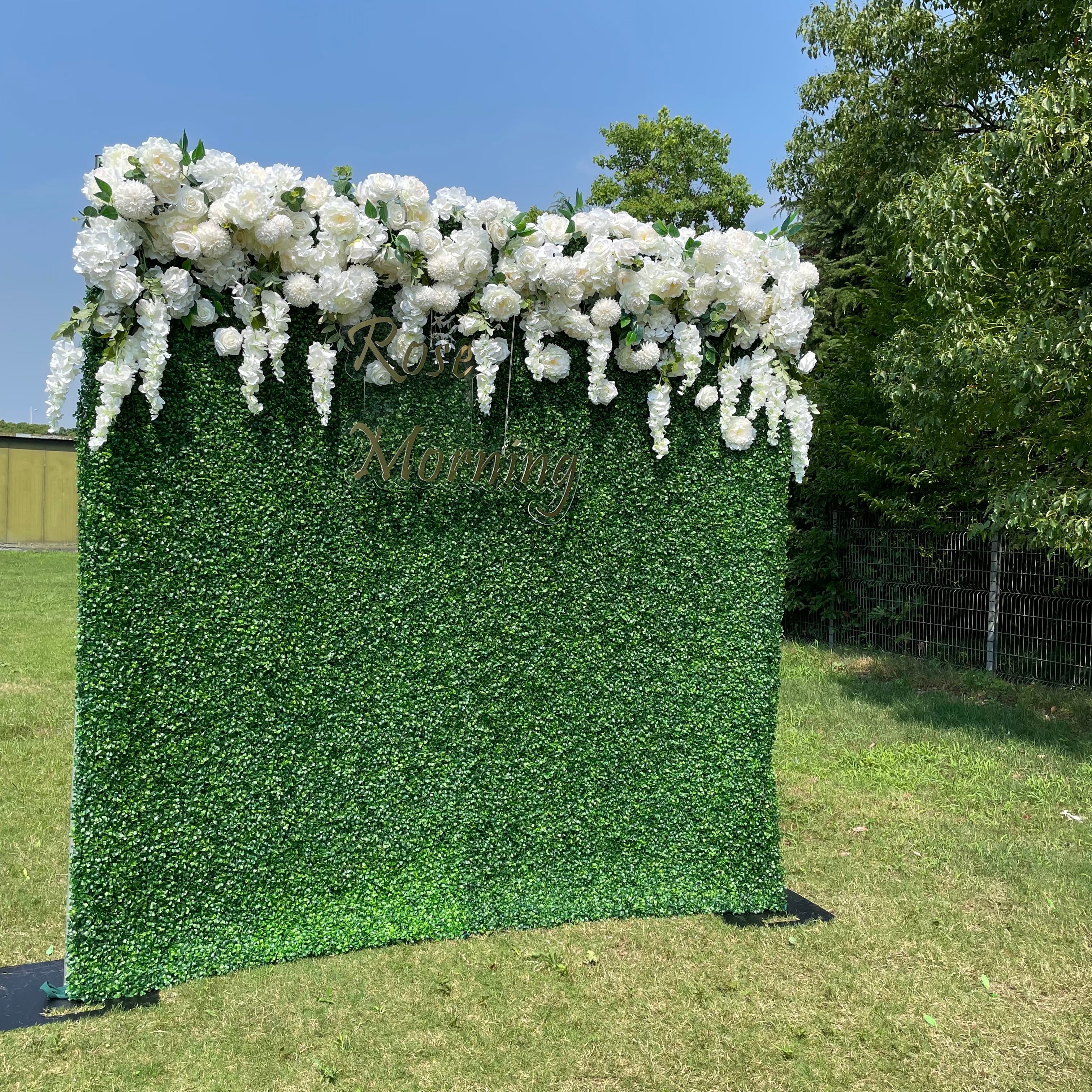 Rose Morning“The flower walls are made of artificial flowers in various colors, layered at different levels to create a lush, elegant and natural look. The exclusive zipper design and roll-up design make it easy to install and remove.”