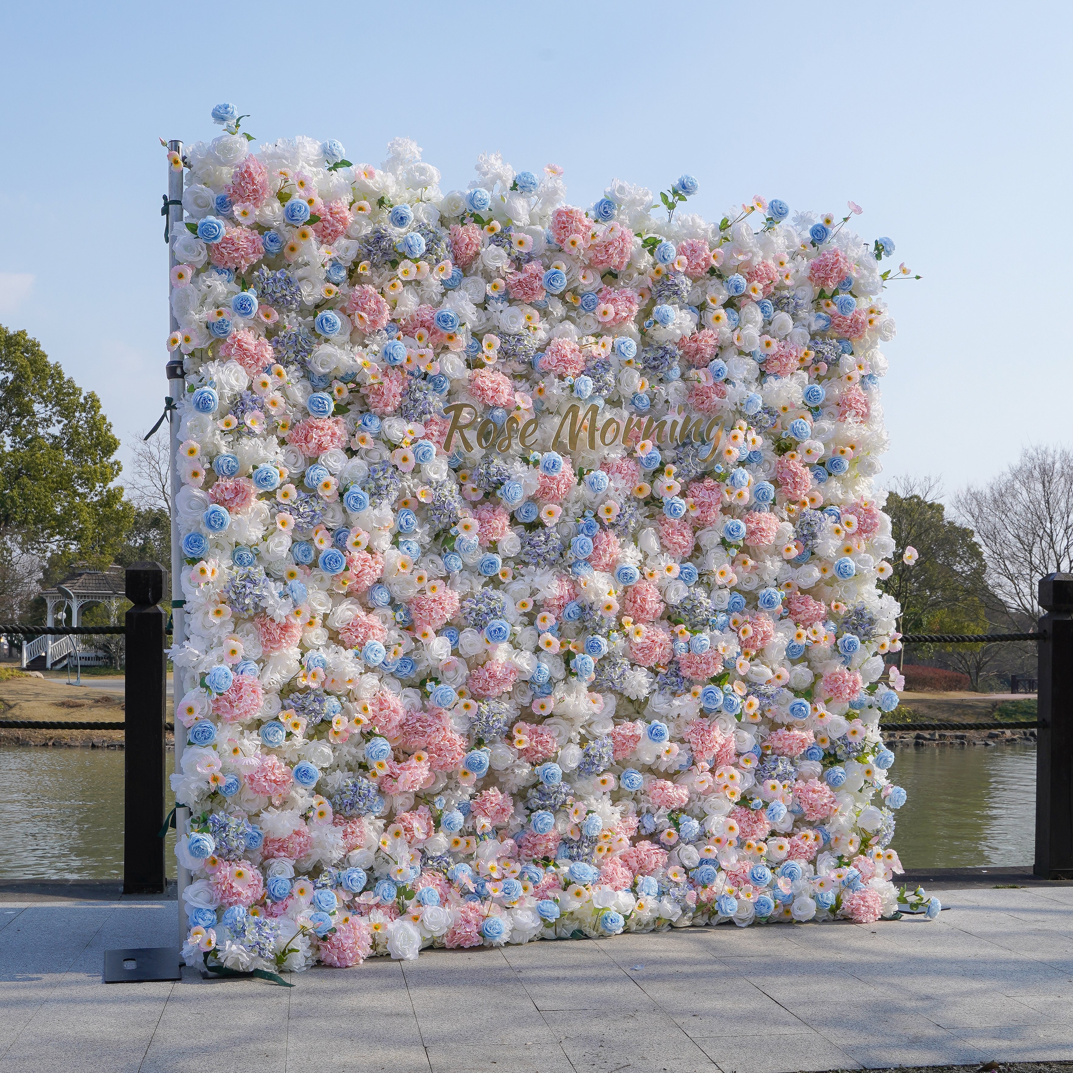 Rose Morning“The flower walls are made of artificial flowers in various colors, layered at different levels to create a lush, elegant and natural look. The exclusive zipper design and roll-up design make it easy to install and remove.”
