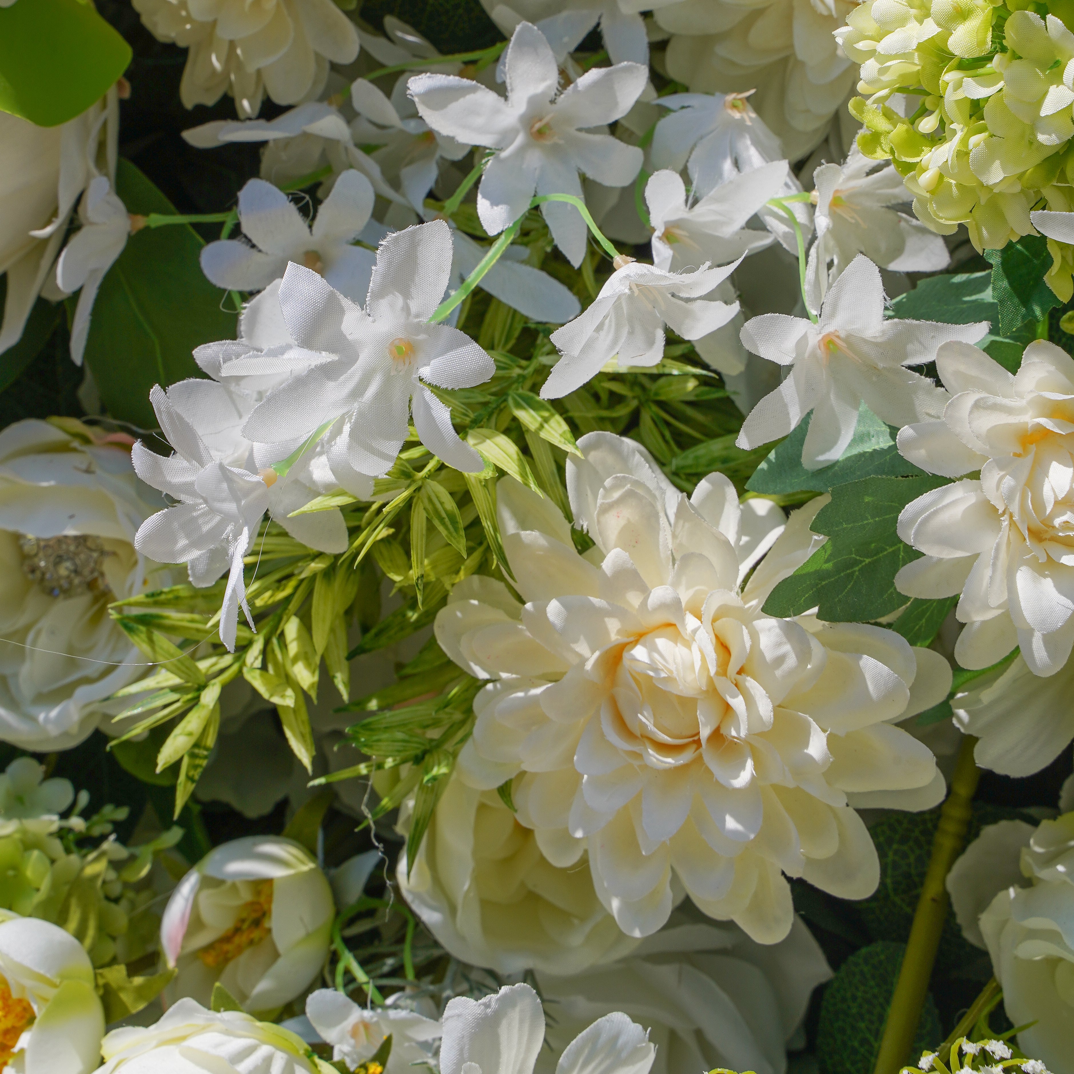 Rose Morning“The flower walls are made of artificial flowers in various colors, layered at different levels to create a lush, elegant and natural look. The exclusive zipper design and roll-up design make it easy to install and remove.”