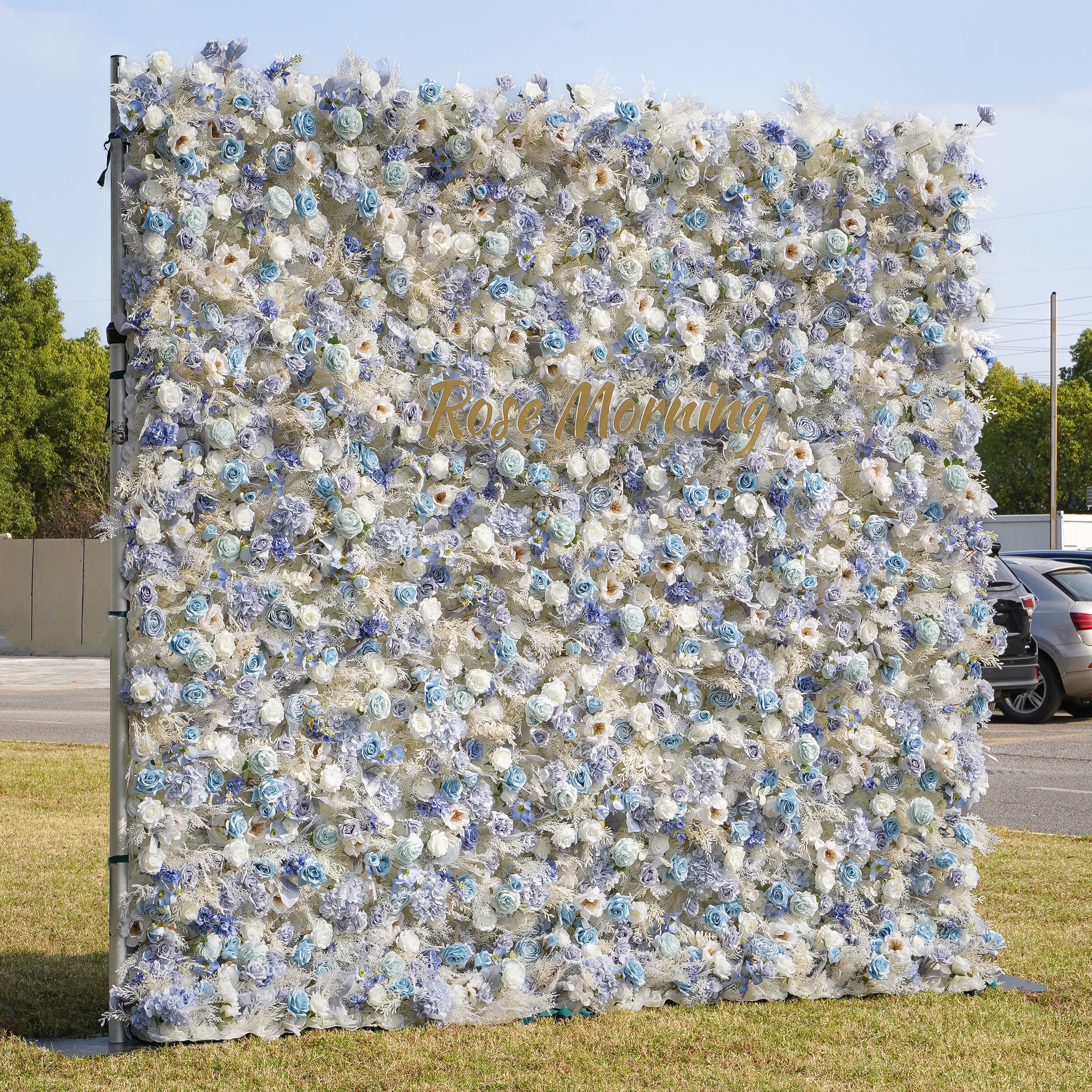 Rose Morning“The flower walls are made of artificial flowers in various colors, layered at different levels to create a lush, elegant and natural look. The exclusive zipper design and roll-up design make it easy to install and remove.”