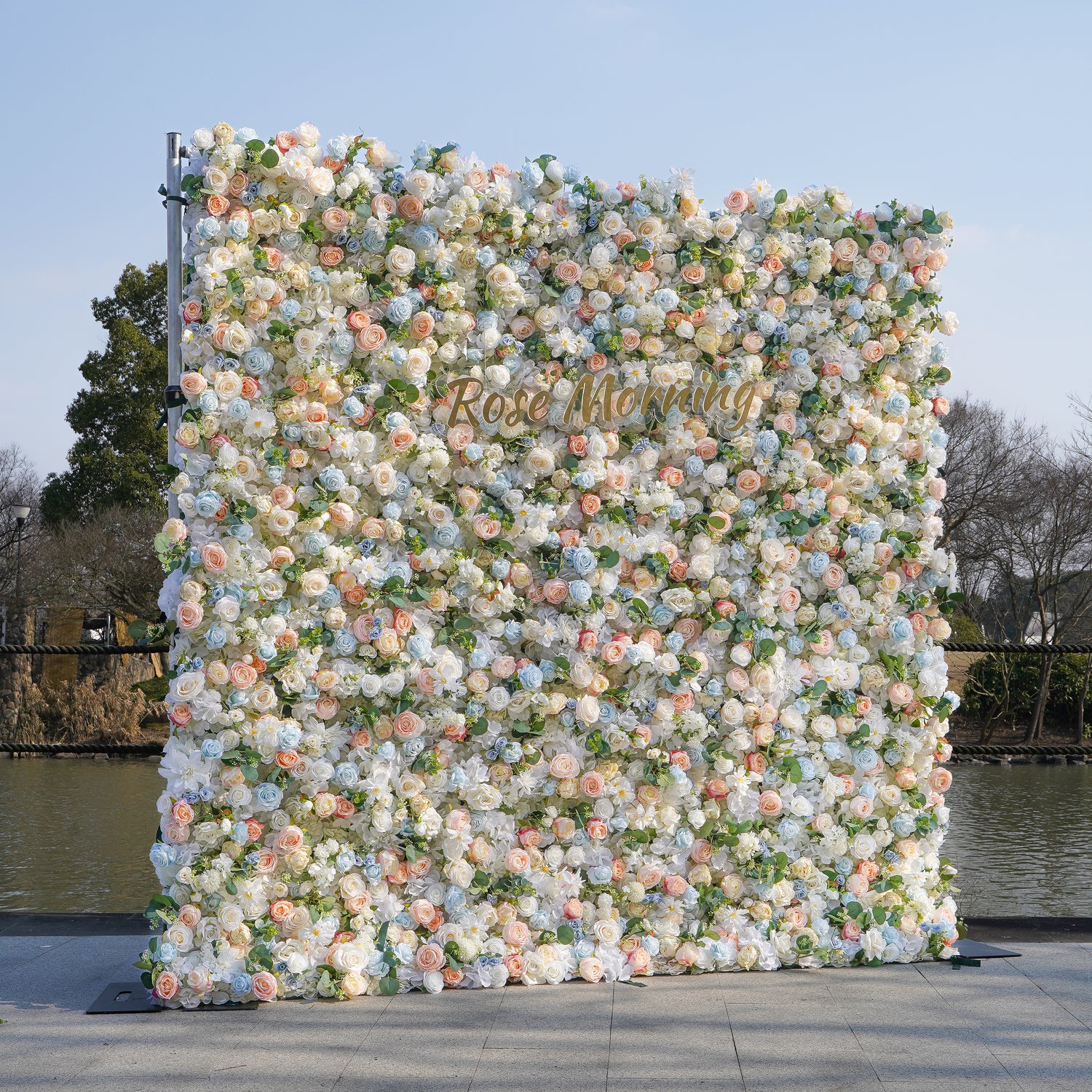 Rose Morning“The flower walls are made of artificial flowers in various colors, layered at different levels to create a lush, elegant and natural look. The exclusive zipper design and roll-up design make it easy to install and remove.”