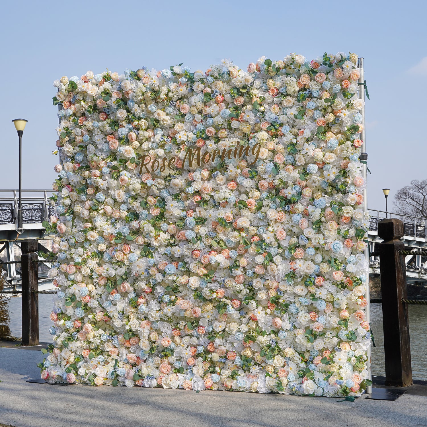 Rose Morning“The flower walls are made of artificial flowers in various colors, layered at different levels to create a lush, elegant and natural look. The exclusive zipper design and roll-up design make it easy to install and remove.”