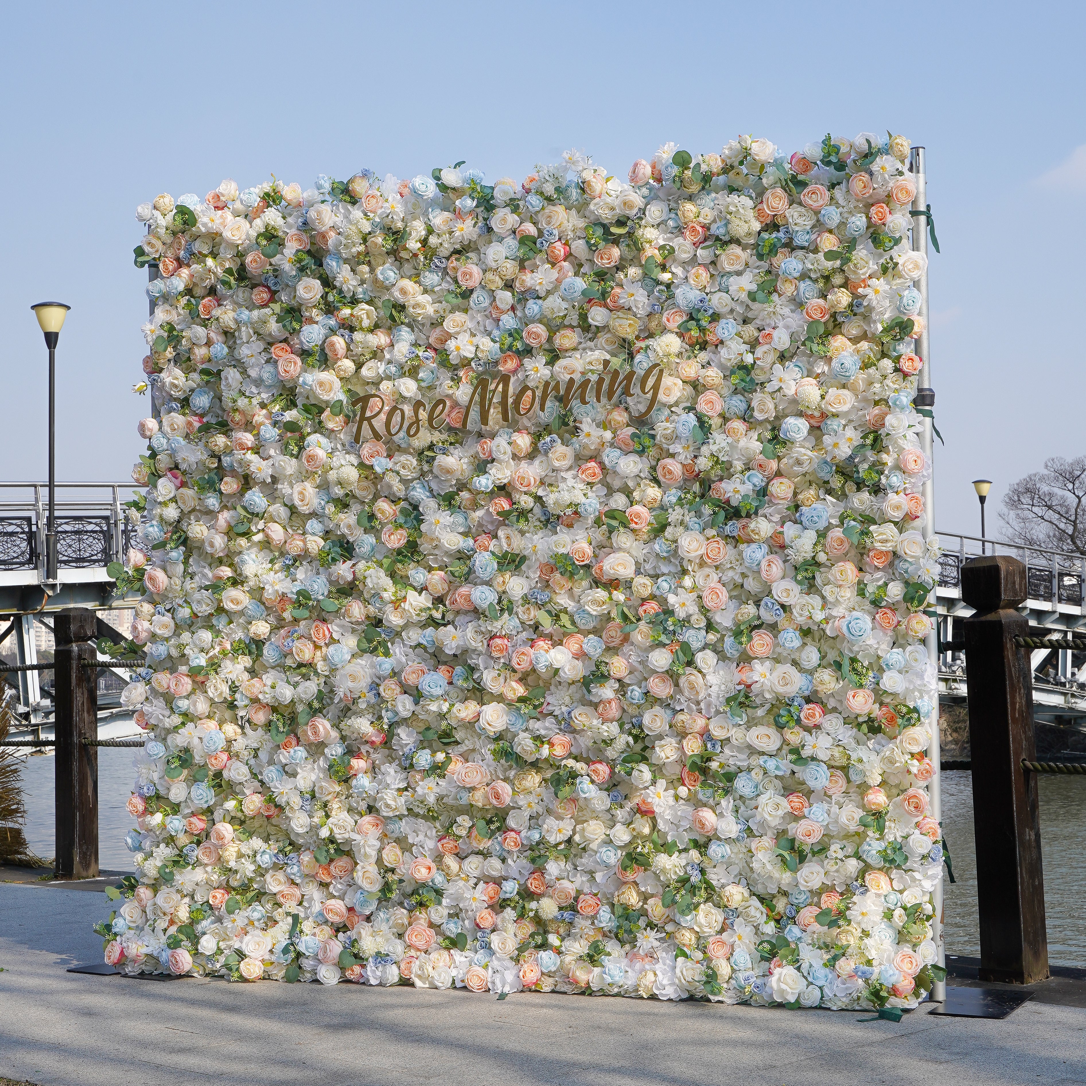 Rose Morning“The flower walls are made of artificial flowers in various colors, layered at different levels to create a lush, elegant and natural look. The exclusive zipper design and roll-up design make it easy to install and remove.”