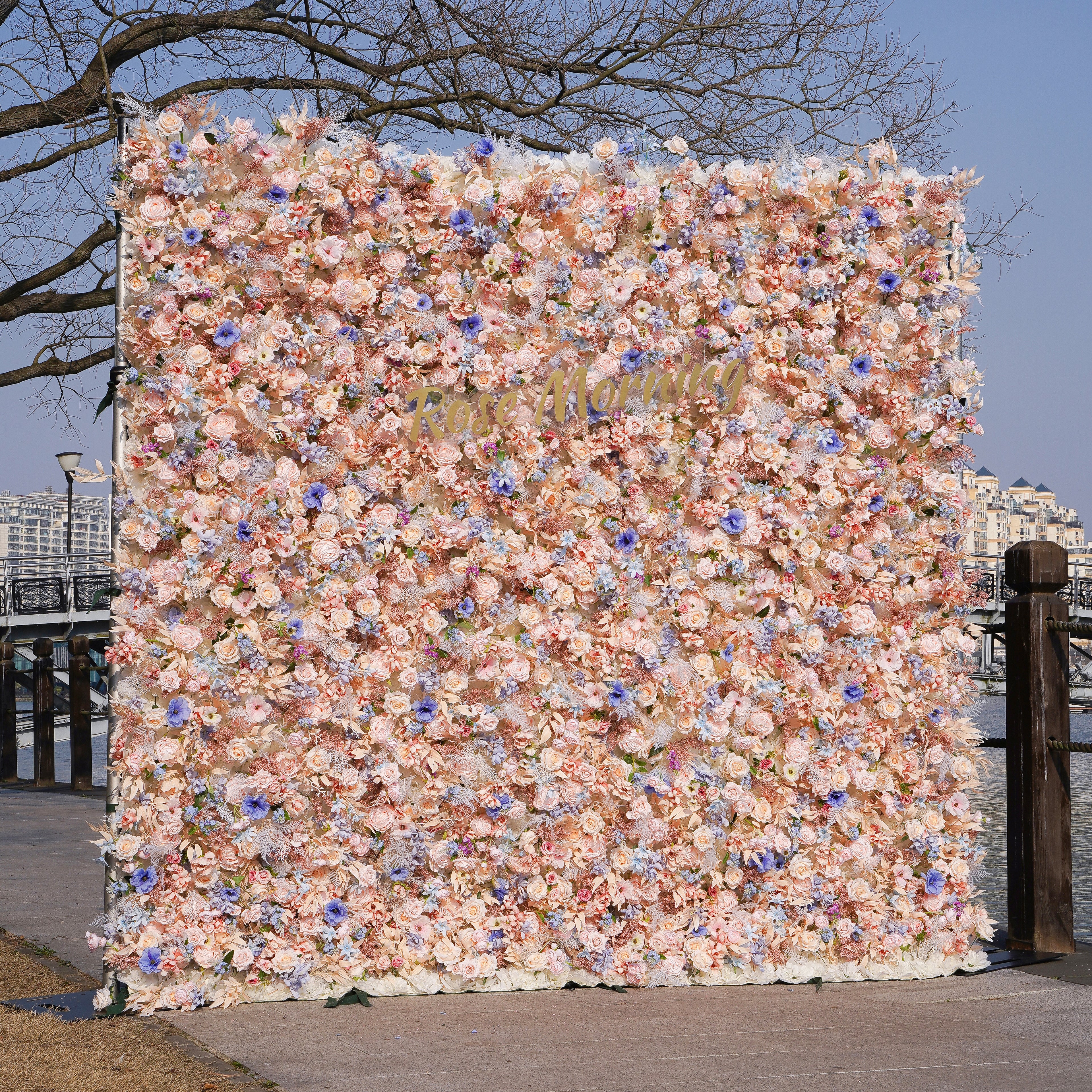 Rose Morning“The flower walls are made of artificial flowers in various colors, layered at different levels to create a lush, elegant and natural look. The exclusive zipper design and roll-up design make it easy to install and remove.”