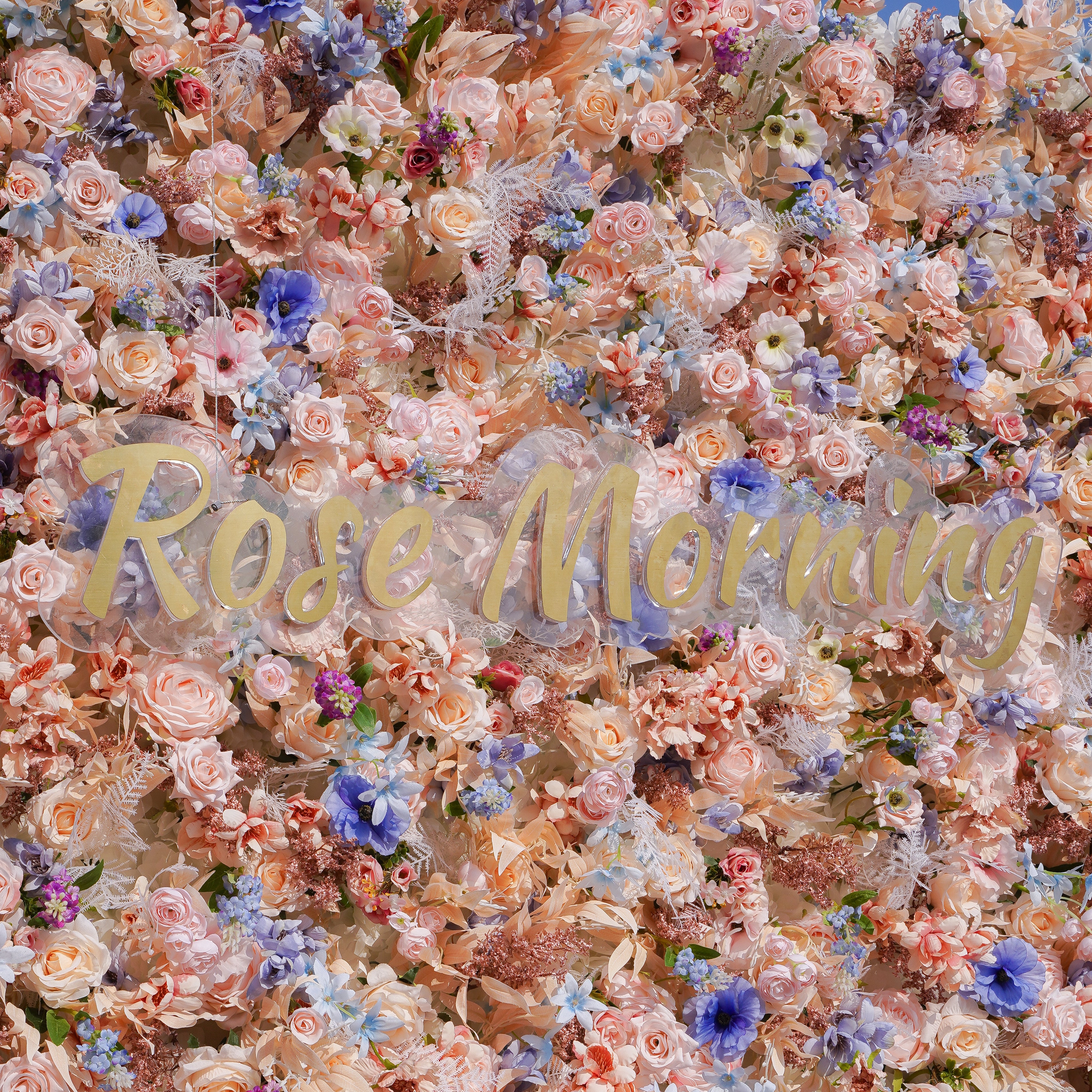 Rose Morning“The flower walls are made of artificial flowers in various colors, layered at different levels to create a lush, elegant and natural look. The exclusive zipper design and roll-up design make it easy to install and remove.”
