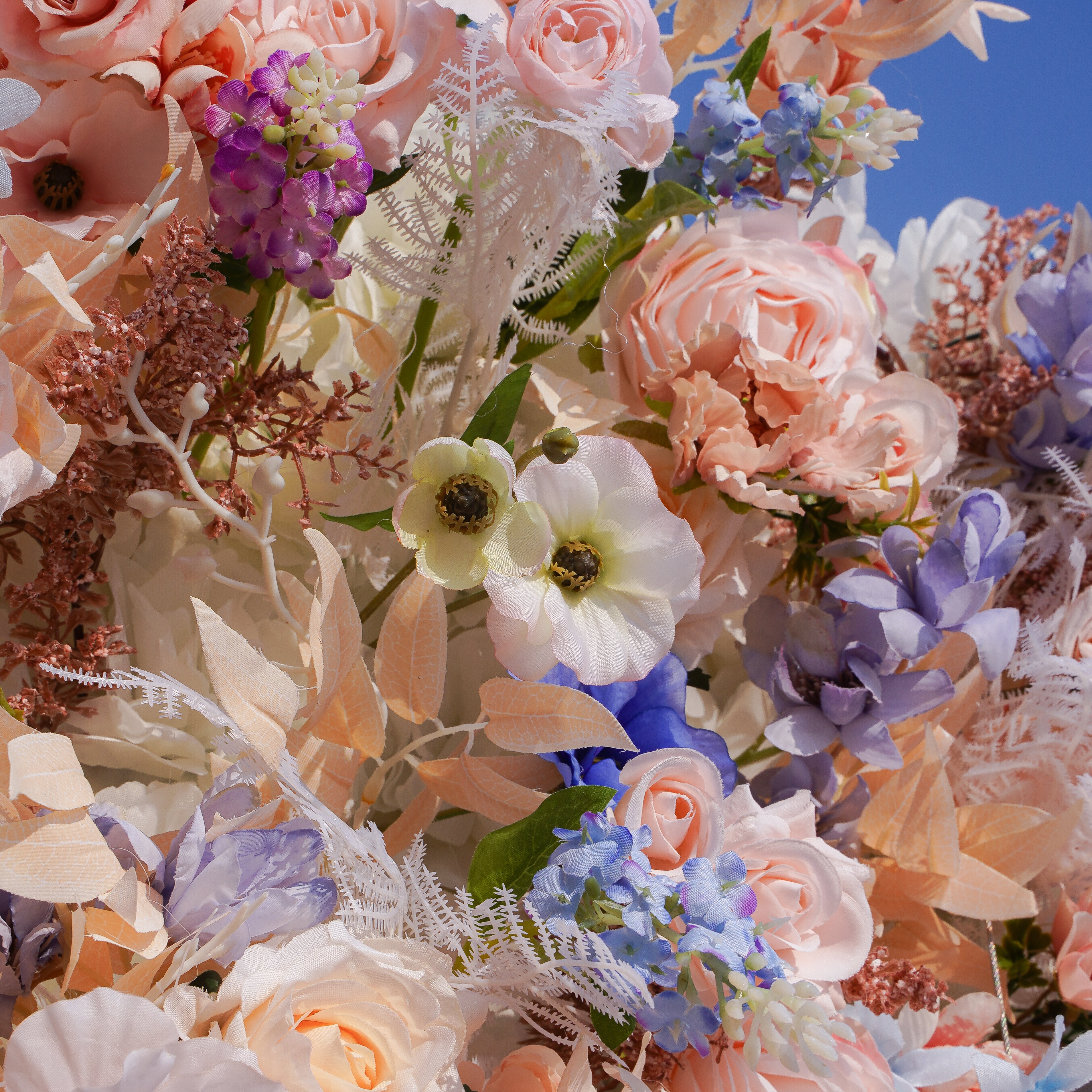 Rose Morning“The flower walls are made of artificial flowers in various colors, layered at different levels to create a lush, elegant and natural look. The exclusive zipper design and roll-up design make it easy to install and remove.”