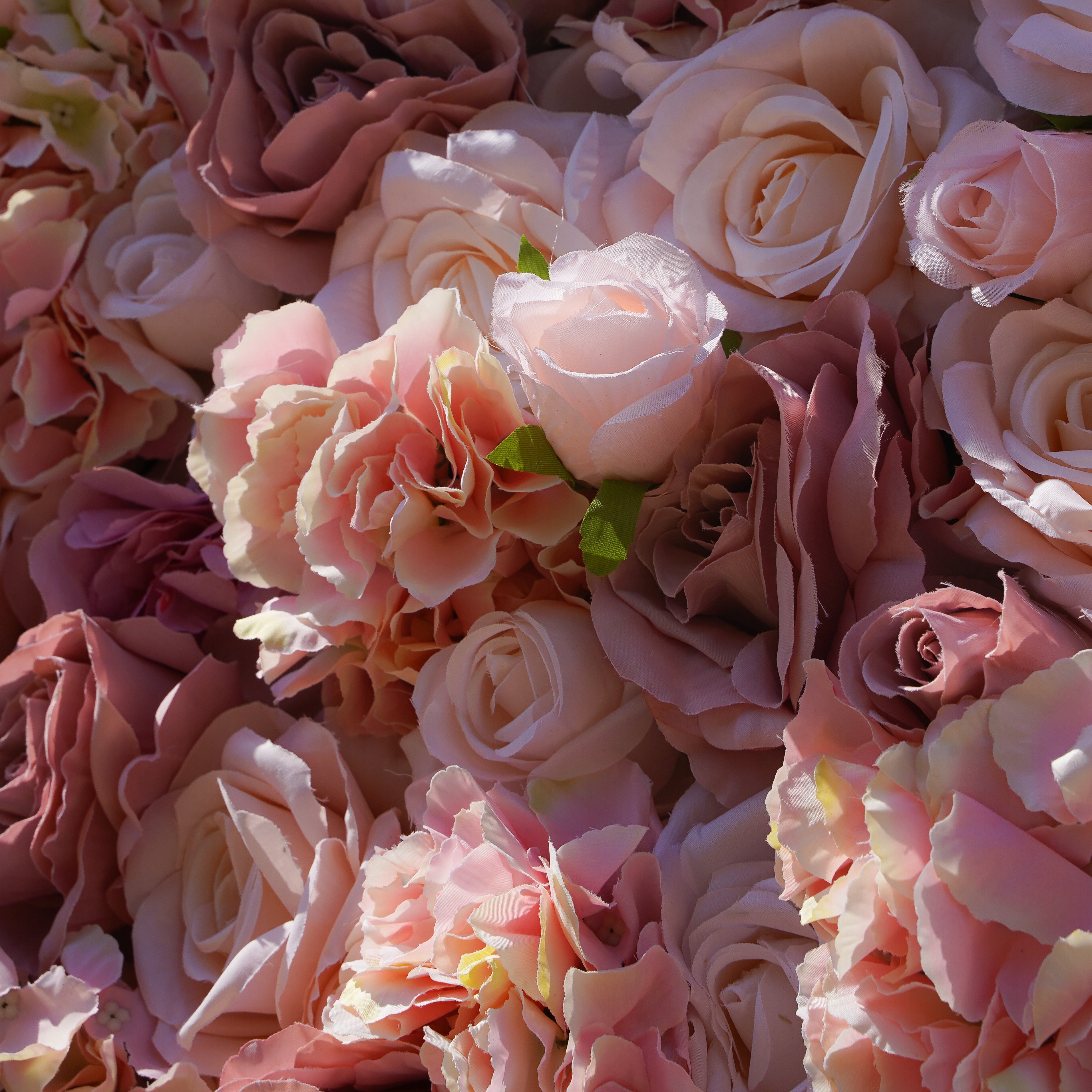 Rose Morning“The flower walls are made of artificial flowers in various colors, layered at different levels to create a lush, elegant and natural look. The exclusive zipper design and roll-up design make it easy to install and remove.”