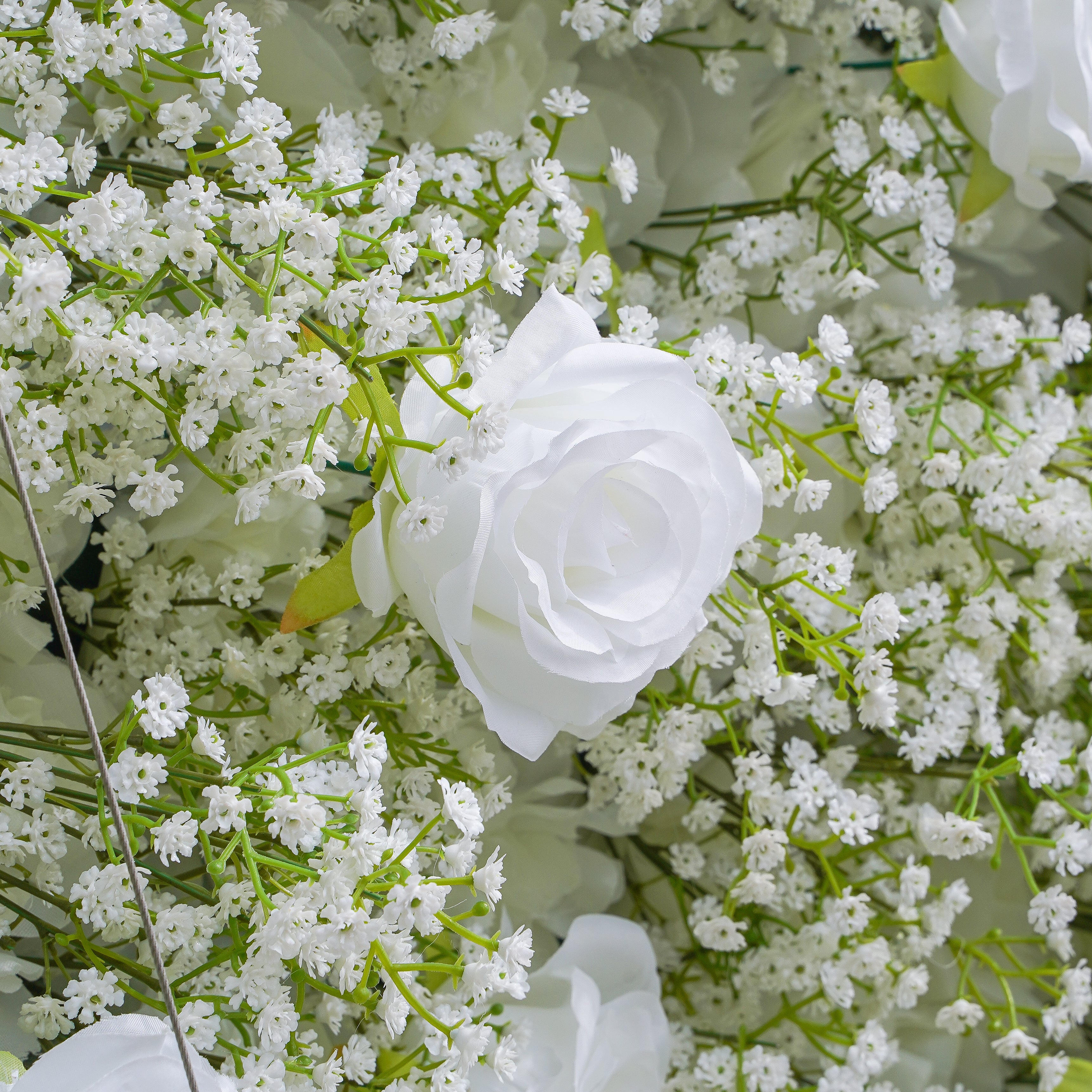 Rose Morning“The flower walls are made of artificial flowers in various colors, layered at different levels to create a lush, elegant and natural look. The exclusive zipper design and roll-up design make it easy to install and remove.”