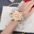 Looking for a beautiful and unique way to add a touch of color to your wedding? Look no further than our orange bridal wrist flowers! These stunning flowers are perfect for adding a pop of orange to your wedding décor, and they&