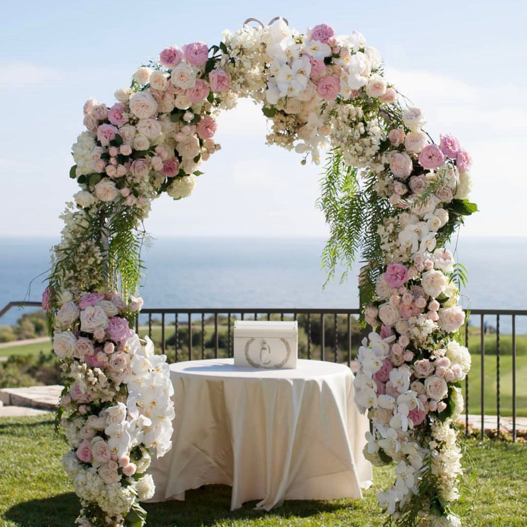 Rose Morning Fay : 2023 New Wedding Party Background Floral Arch Decoration Including Frame -R861 is a beautiful and elegant floral arch, perfect for weddings or other events. The flower arch is made of high-quality artificial flowers and decorated with a metal frame. Big enough for your guests to take pictures and keep. It&