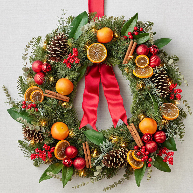 Festive Christmas Wreath with Dried Oranges, Cinnamon and Red Ribbon