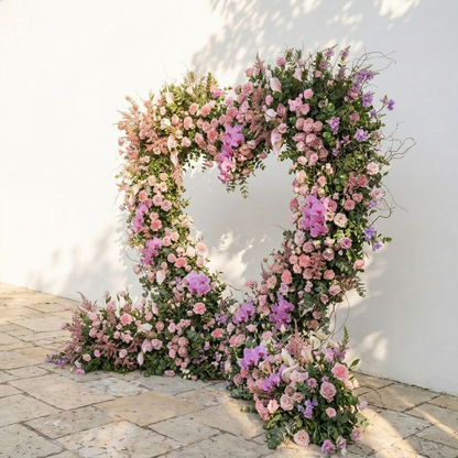 Calyra: Lush Pink &amp; Lavender Heart-Shaped Floral Arch for Elegant Garden Wedding &amp; Proposal Party