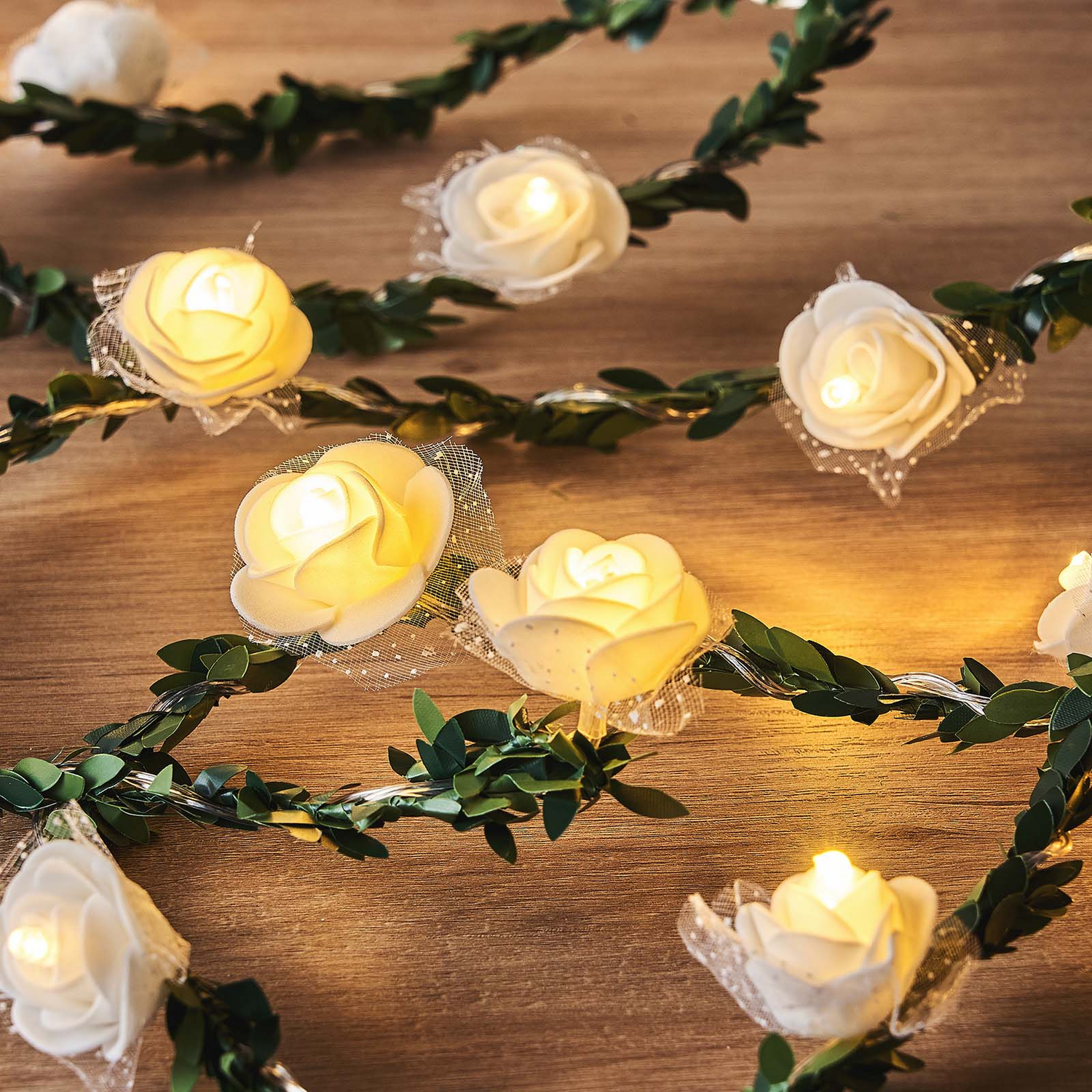 This Warm White 20 LED Faux Rose Lace Garland Vine String Lights is the perfect decoration for any occasion, be it formal or casual. It is made of high-quality artificial flowers and lace petals, and is decorated with LED light beads, enough for your guests to take photos and take pictures. It&