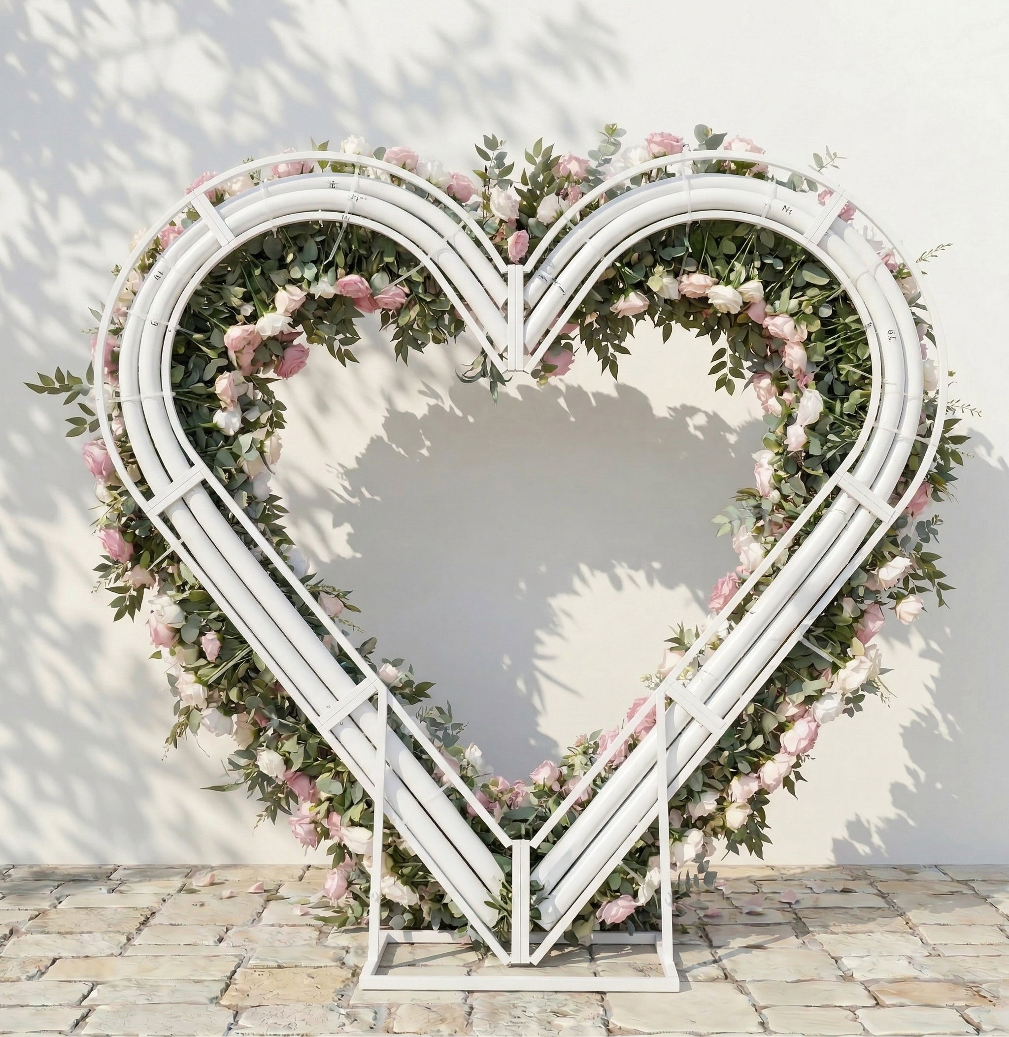 Elowira: Sweet Pink Flower Heart Arch with Lush Greenery for Proposal and Bridal Shower Decor