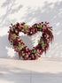 Valie:  Heart-Shaped Floral Arch for Elegant Garden Wedding & Proposal Party — front view