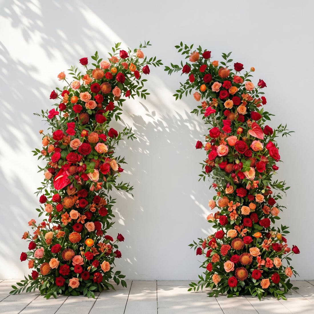 Velyne: Deep Red, Warm Orange &amp; Coral Anthurium Silk Floral Ground Horn Arch Arrangement with Soft Sorelia &amp; Lush Cascading Greenery for Romantic Minimalist Weddings &amp; Garden Event Decor Including Frame