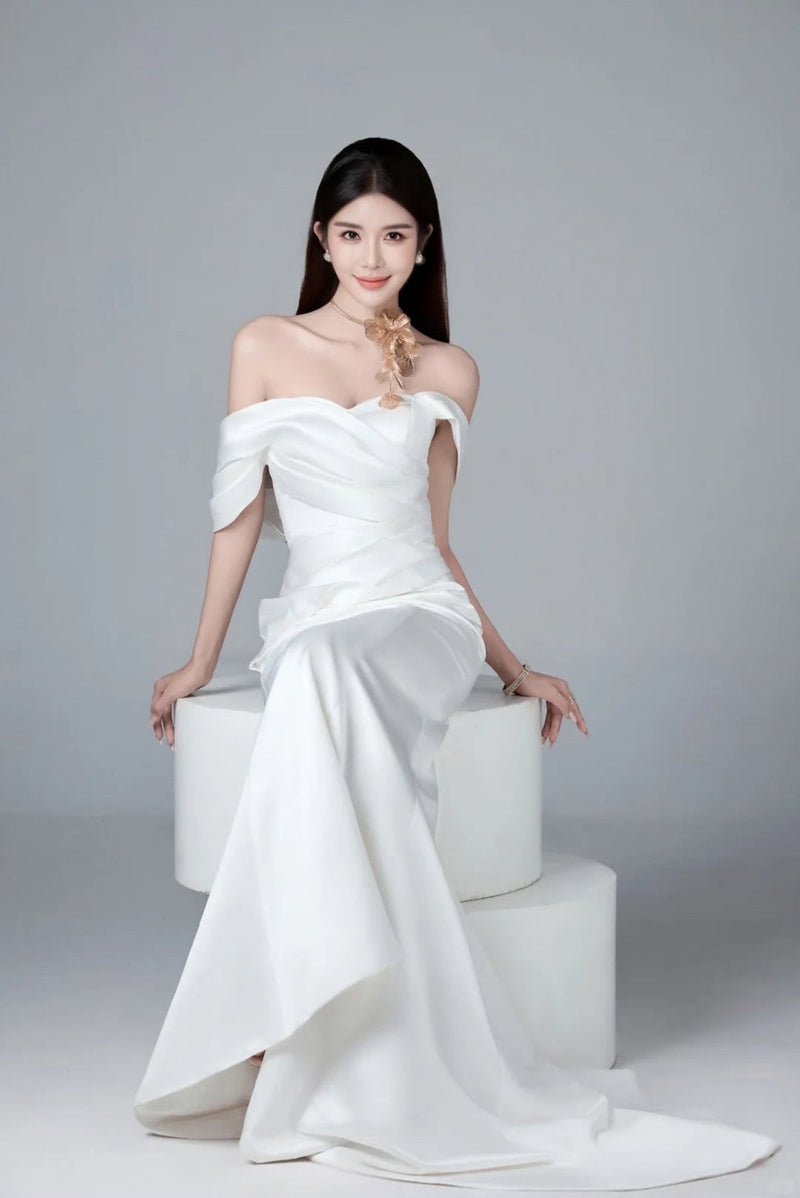 Lucy, founder of Rose Morning, in a white gown