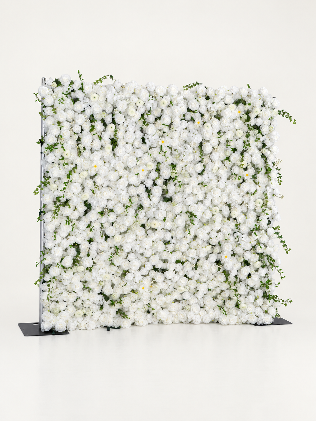 Galia white flower wall with greenery, angled view