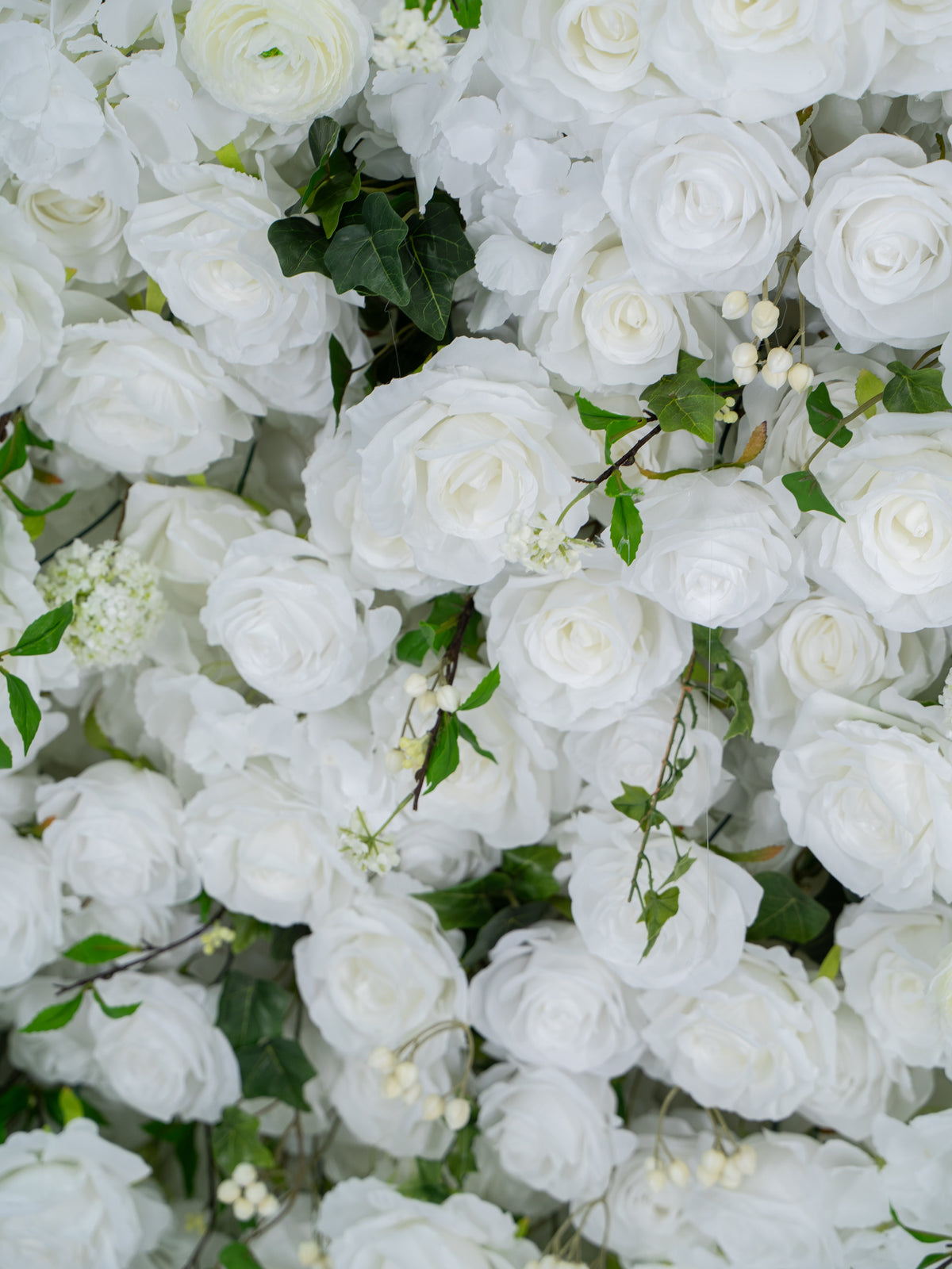 Galia trailing greenery and white roses, detail