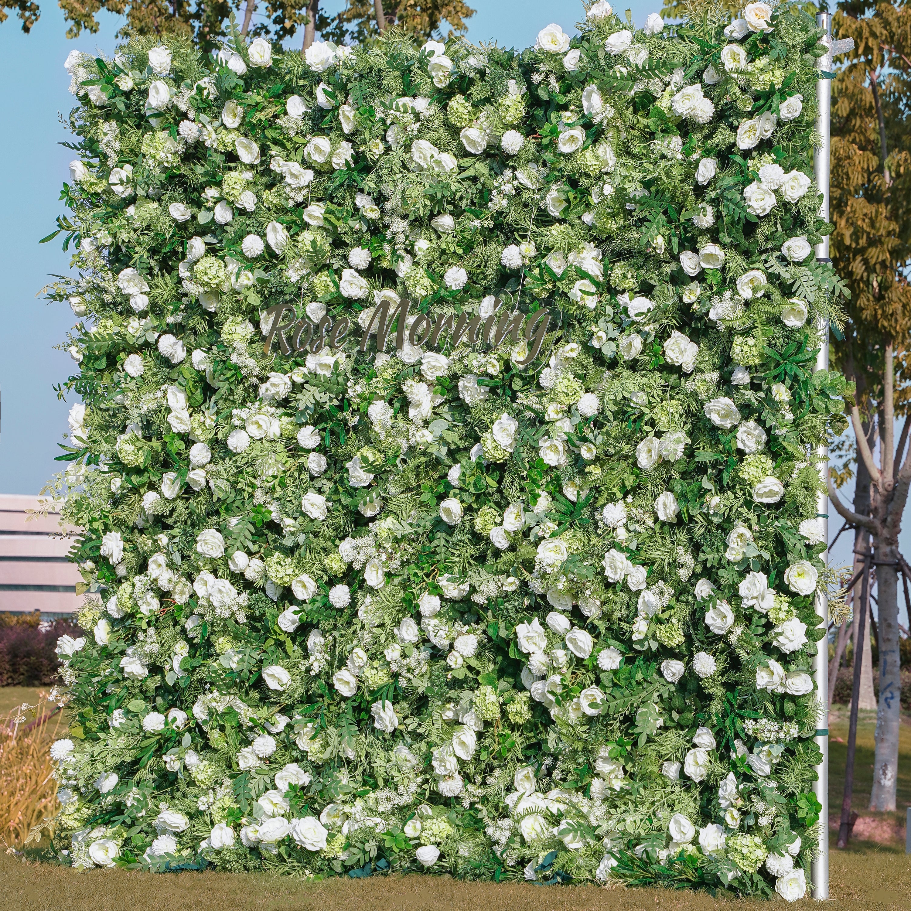 Rose Morning“The flower walls are made of artificial flowers in various colors, layered at different levels to create a lush, elegant and natural look. The exclusive zipper design and roll-up design make it easy to install and remove.”