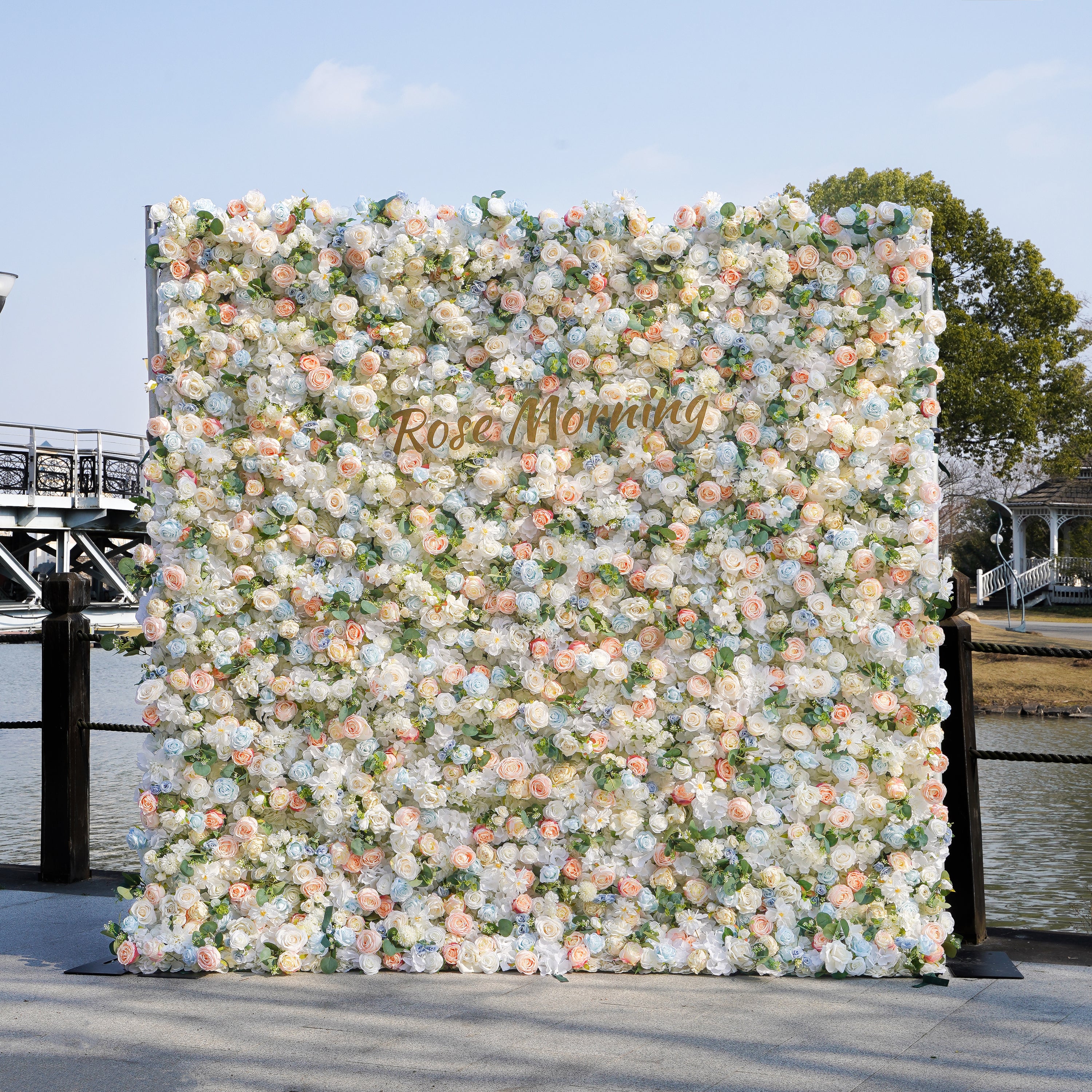 Rose Morning“The flower walls are made of artificial flowers in various colors, layered at different levels to create a lush, elegant and natural look. The exclusive zipper design and roll-up design make it easy to install and remove.”