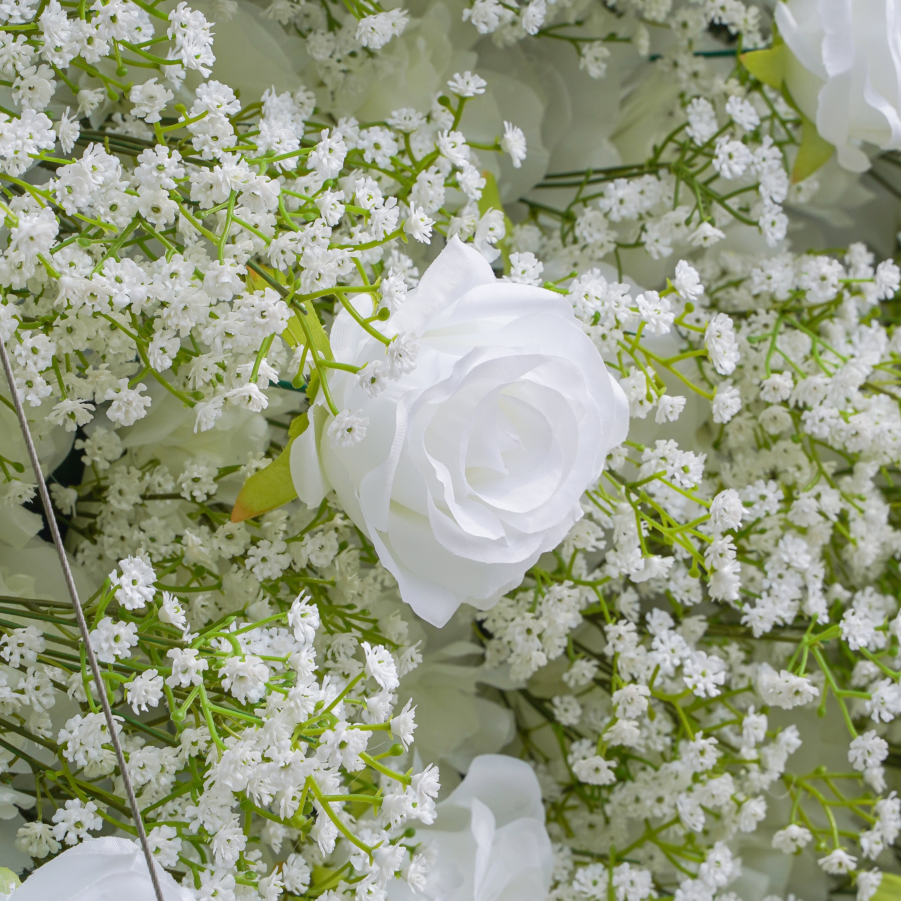 Rose Morning“The flower walls are made of artificial flowers in various colors, layered at different levels to create a lush, elegant and natural look. The exclusive zipper design and roll-up design make it easy to install and remove.”